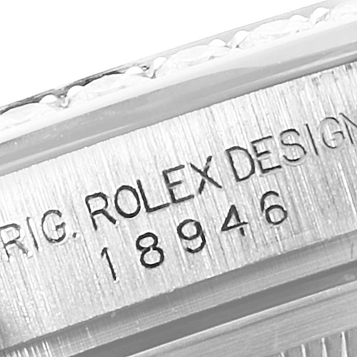 The image shows a close-up of the engraved model number "18946" on the side of a Rolex Pearlmaster 18948 Men's Platinum Silver Dial 18948 Men's Platinum Silver Dial watch case.