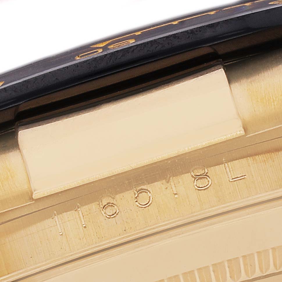 This close-up image showcases the side view of the bezel and case with the serial number of a Rolex Daytona 116518 Men's Yellow Gold Champagne Dial 116518 Men's Yellow Gold Champagne Dial watch.
