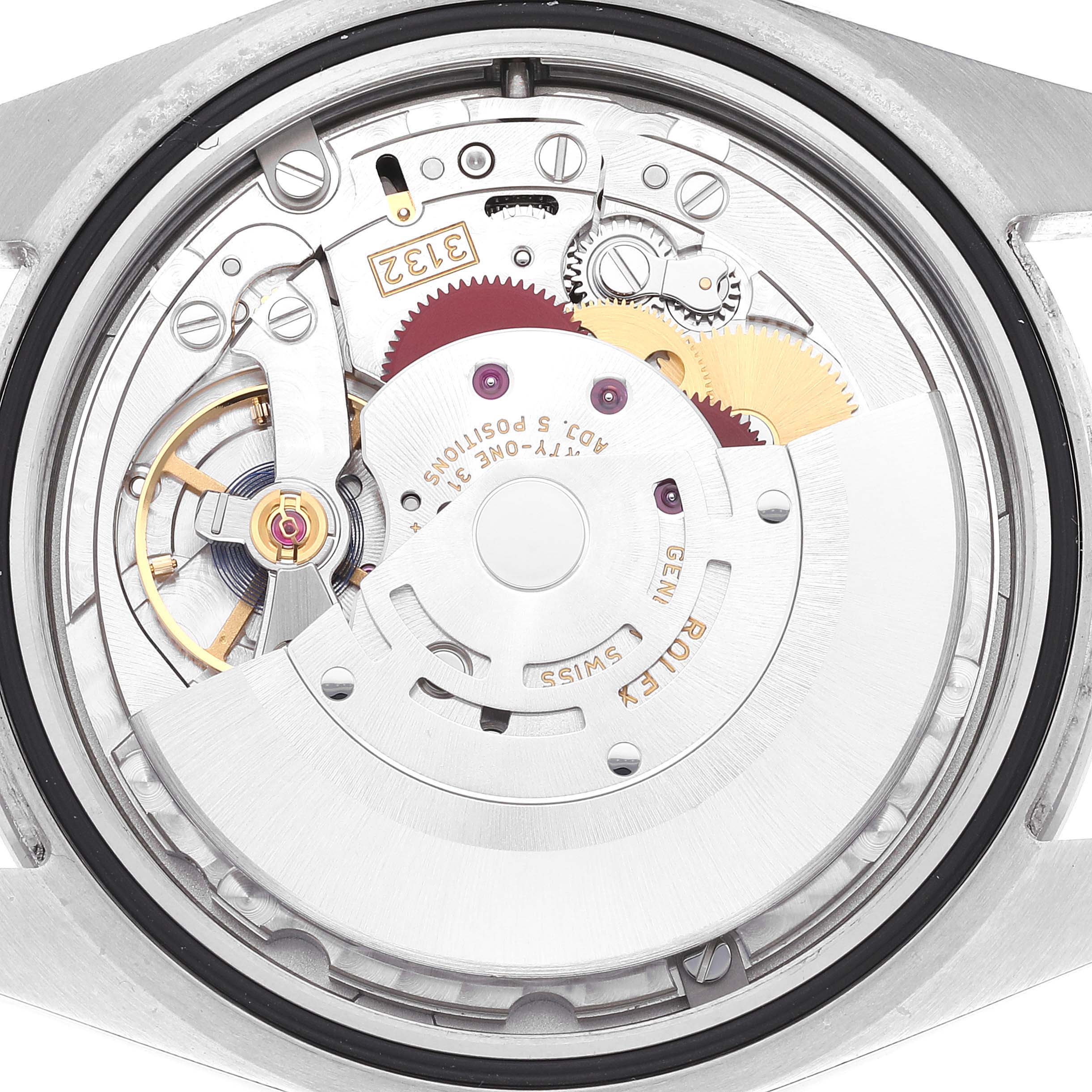 This is a close-up view of the movement mechanism inside a Rolex Explorer 214270 Men's Stainless Steel Black Dial 214270 Men's Stainless Steel Black Dial watch.