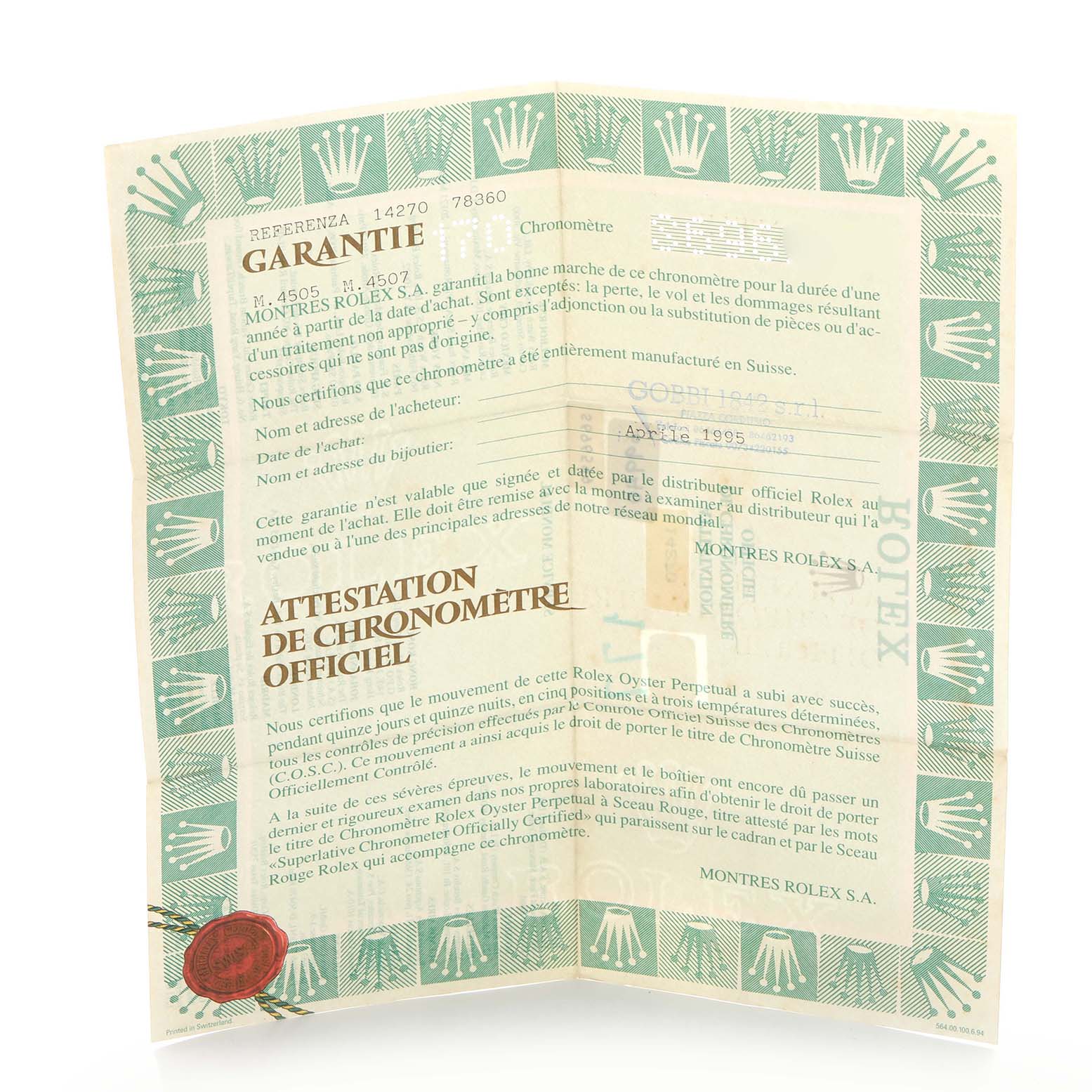 The image shows a folded warranty certificate for the Rolex Explorer 14270 Men
s Stainless Steel Black Dial 14270 Men
s Stainless Steel Black Dial watch, featuring text and decorative patterns.