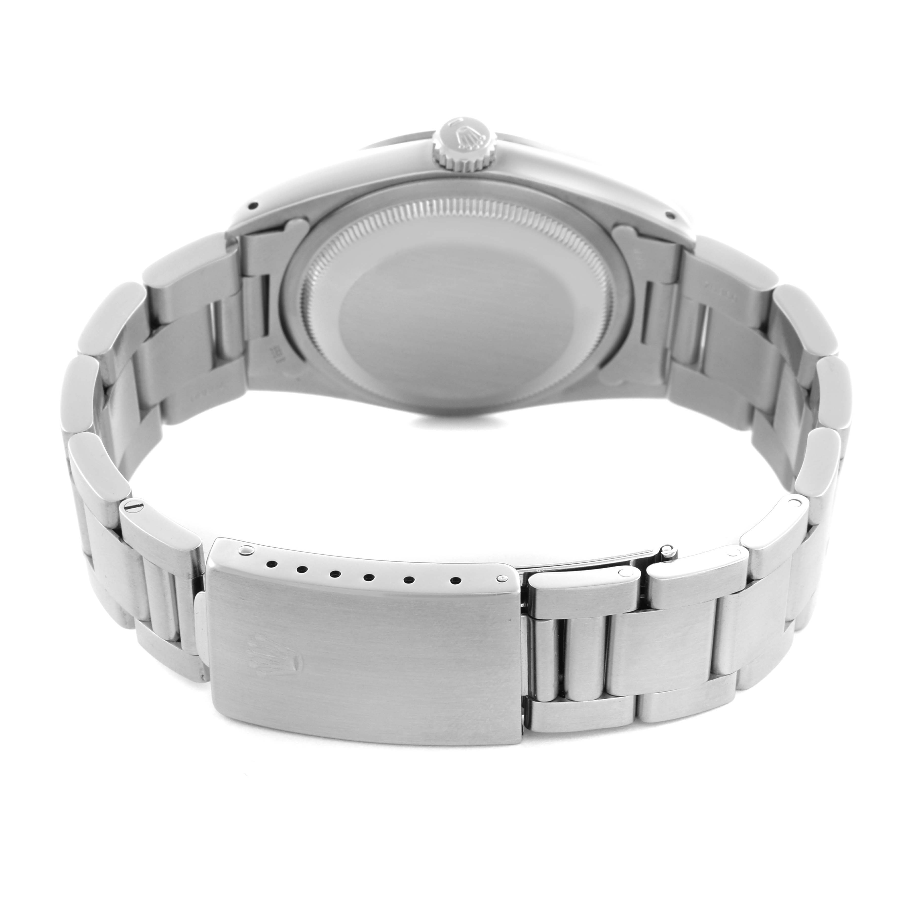 The image shows the back view of the Rolex Explorer 14270 Men
s Stainless Steel Black Dial 14270 Men
s Stainless Steel Black Dial watch, highlighting the case back, crown, and stainless steel bracelet with clasp.