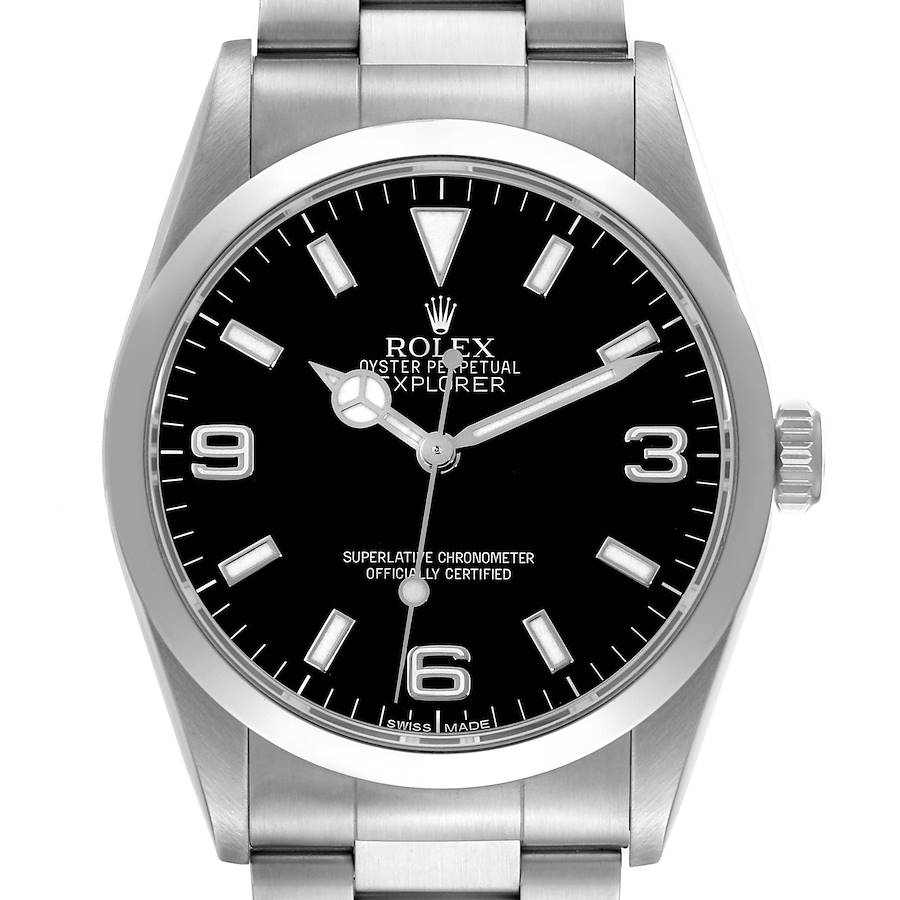 The Rolex Explorer watch is shown from a front angle, displaying the dial, hands, crown, and part of the stainless steel bracelet.