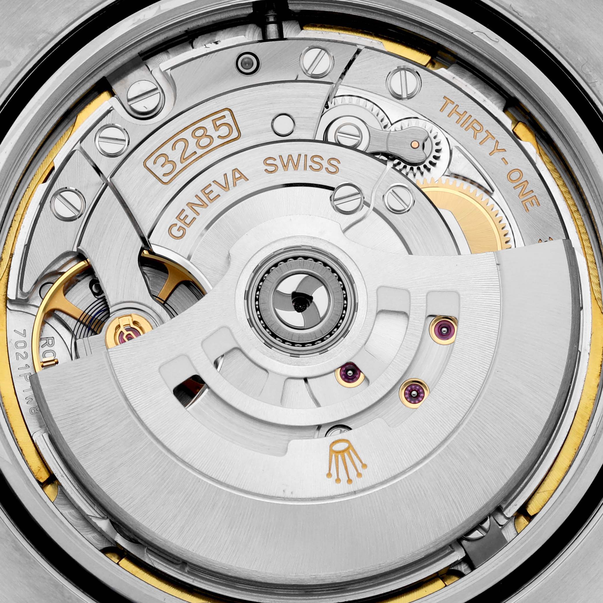 The image shows a close-up of the movement mechanism inside the Rolex Explorer M226570-0002 Men's Stainless Steel Black Dial M226570-0002 Men's Stainless Steel Black Dial watch.