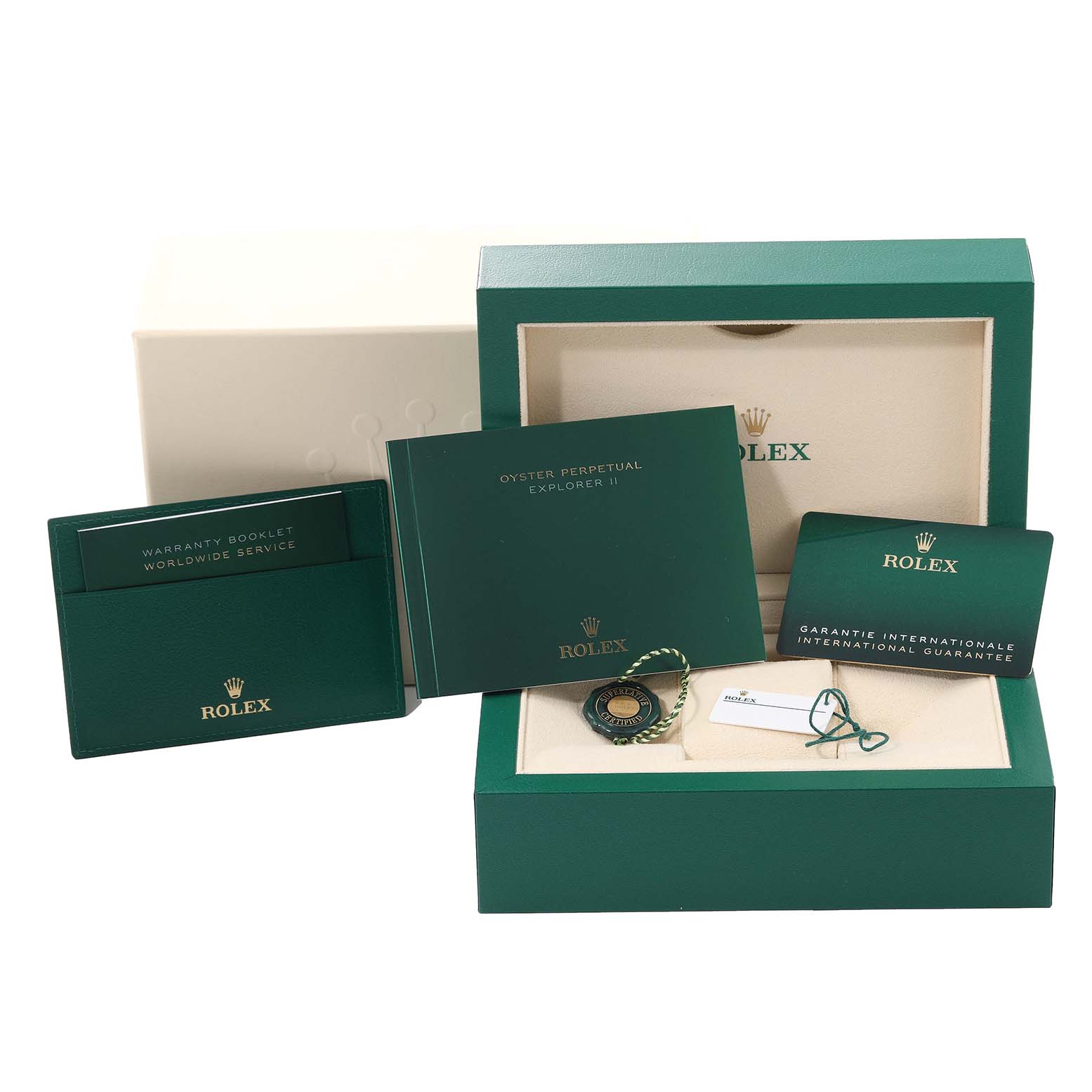 This image shows the accessories for a Rolex Explorer M226570-0002 Men's Stainless Steel Black Dial M226570-0002 Men's Stainless Steel Black Dial model, including the box, booklets, and warranty card.
