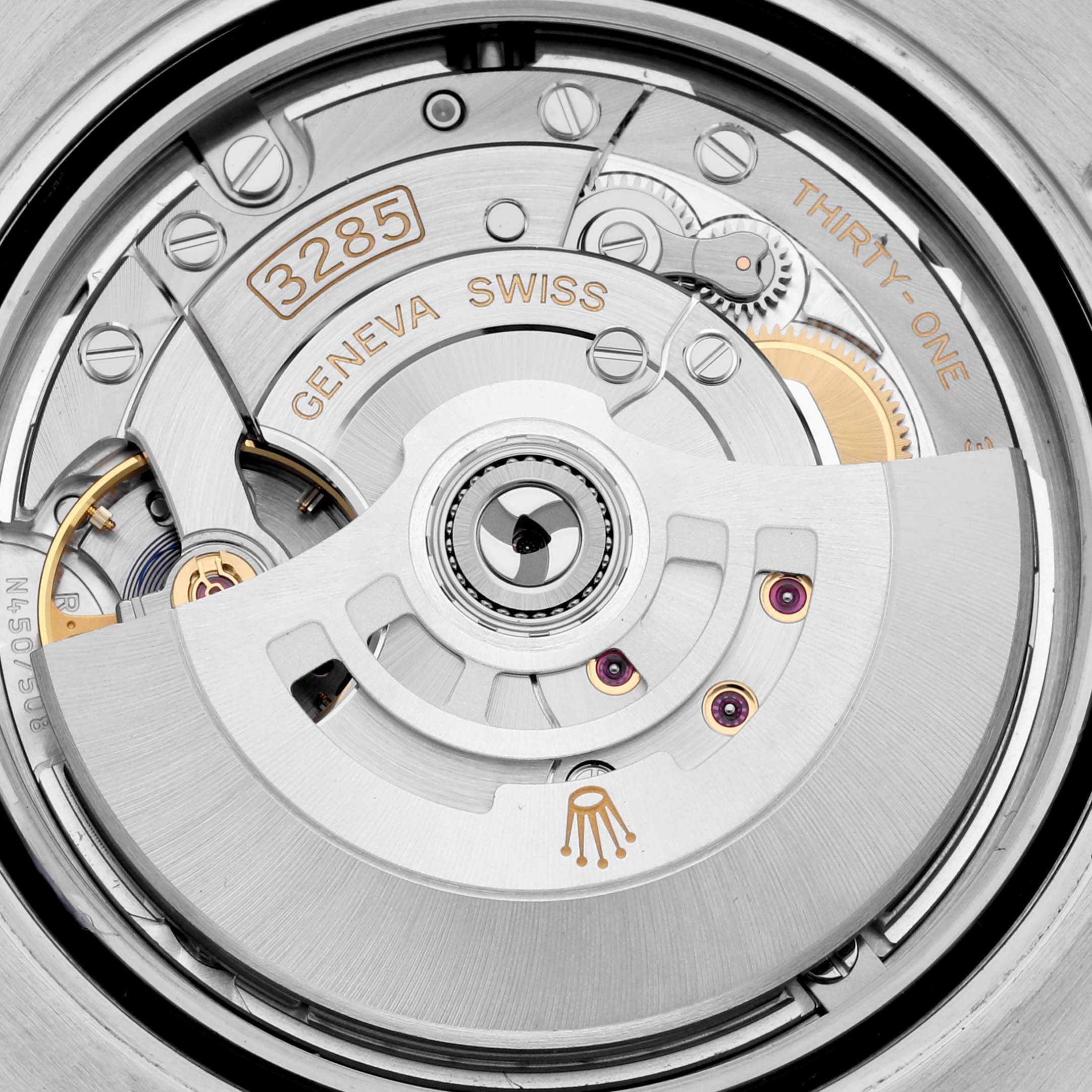 This image shows the movement mechanism of the Rolex GMT-Master 126711CHNR Men's Steel and Gold (two tone) Black Dial 126711CHNR Men's Steel and Gold (two tone) Black Dial, specifically the caliber 3285.