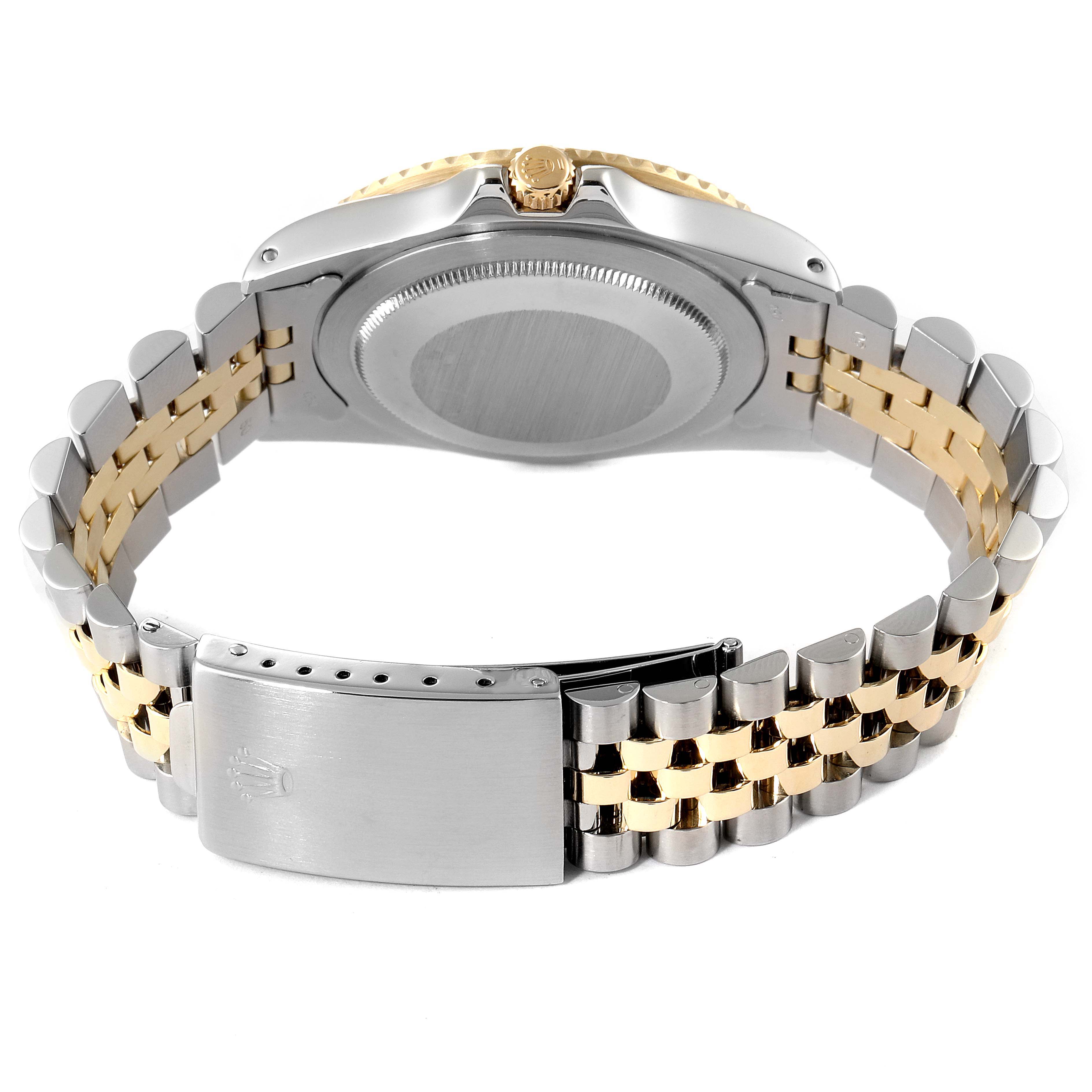 This image shows the back case and clasp of a Rolex Vintage Collection 16753 Men's Steel and Gold (two tone) Brown Dial 16753 Men's Steel and Gold (two tone) Brown Dial watch, highlighting the two-tone bracelet.