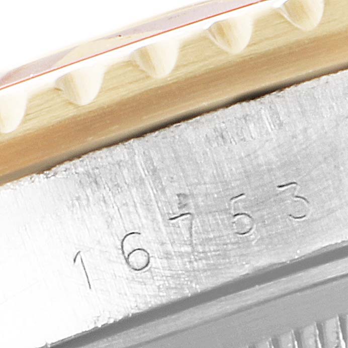 The image shows a close-up of the side of the bezel and the engraved model number on the case of the Rolex Vintage Collection 16753 Men's Steel and Gold (two tone) Brown Dial 16753 Men's Steel and Gold (two tone) Brown Dial watch.
