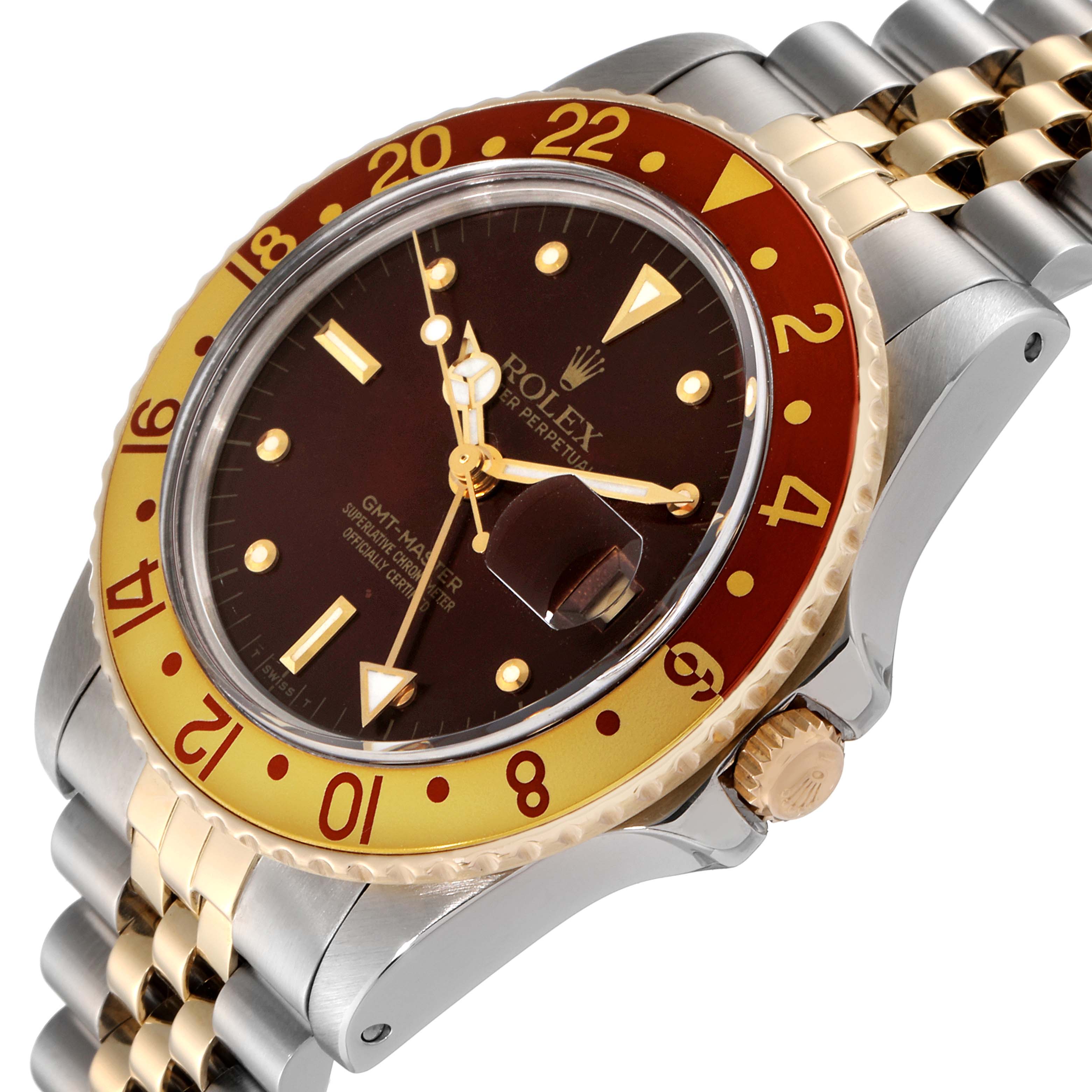 This Vintage Collection Rolex GMT-Master watch is shown at an angled view highlighting the bezel, dial, crown, and part of the bracelet.