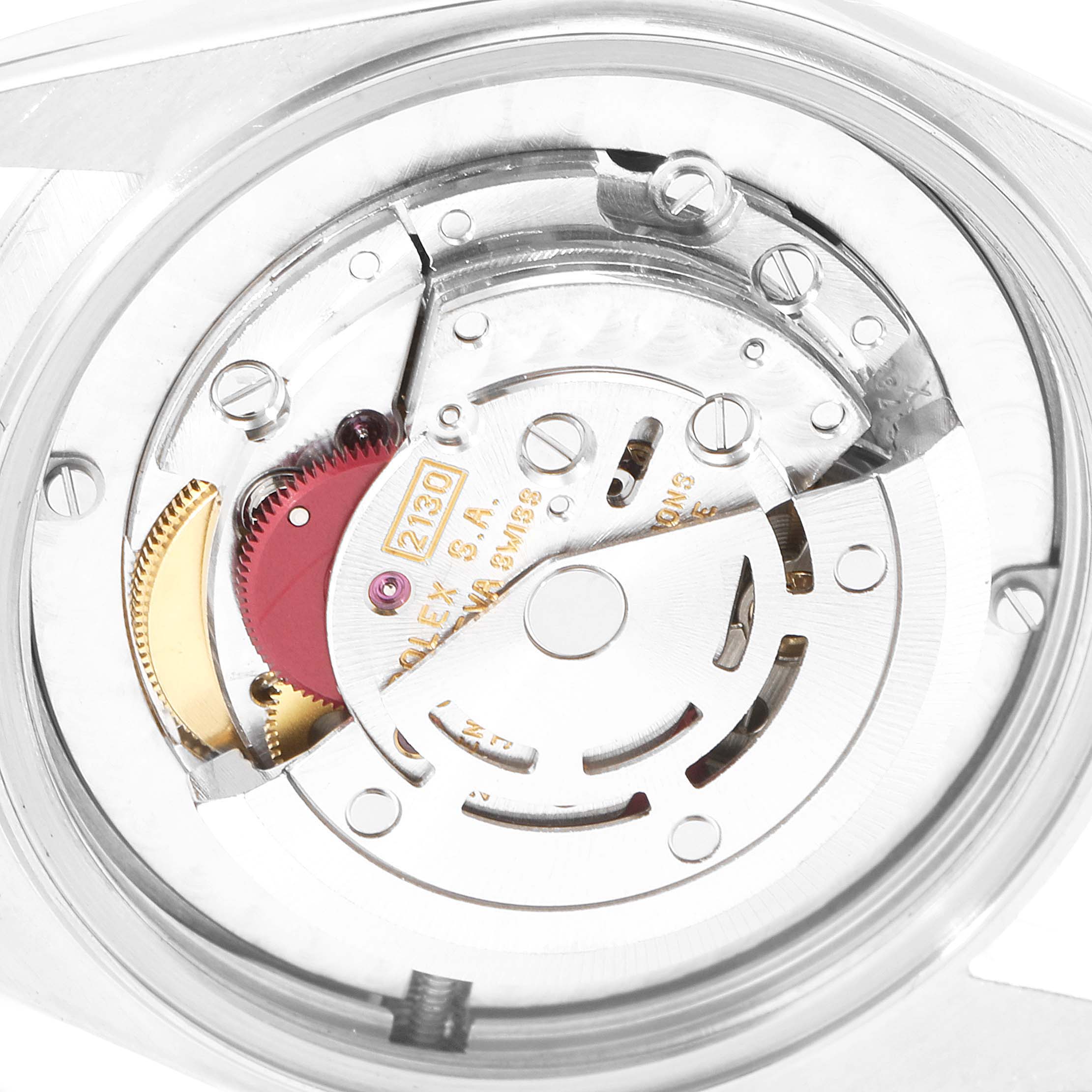 This image shows the inner mechanical movement of a Mid-Size Rolex watch viewed from the back.