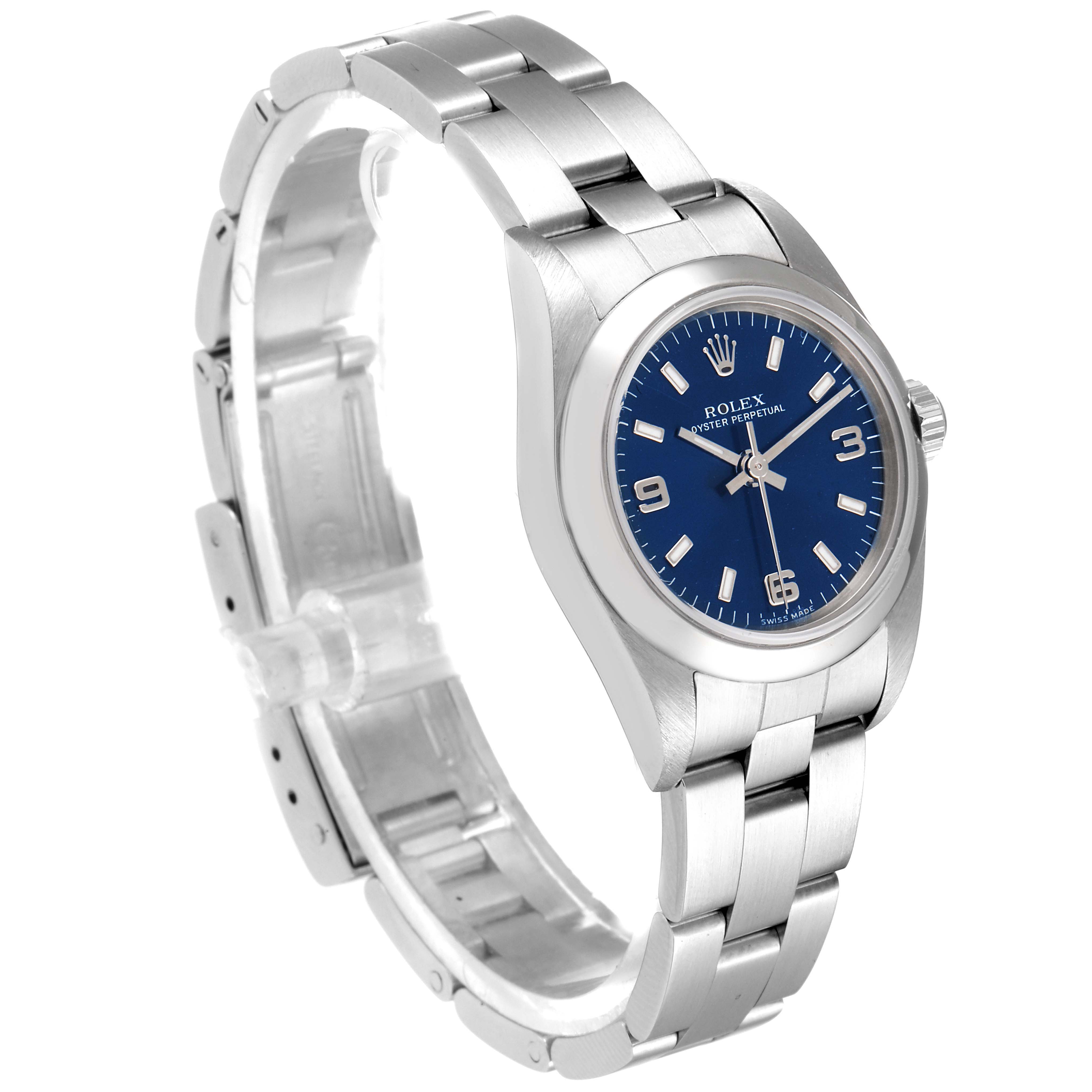 The image shows a side angle view of a Rolex Oyster Perpetual 76080 Women
s Stainless Steel Blue Dial 76080 Women
s Stainless Steel Blue Dial watch, highlighting its bracelet, case, and dial.