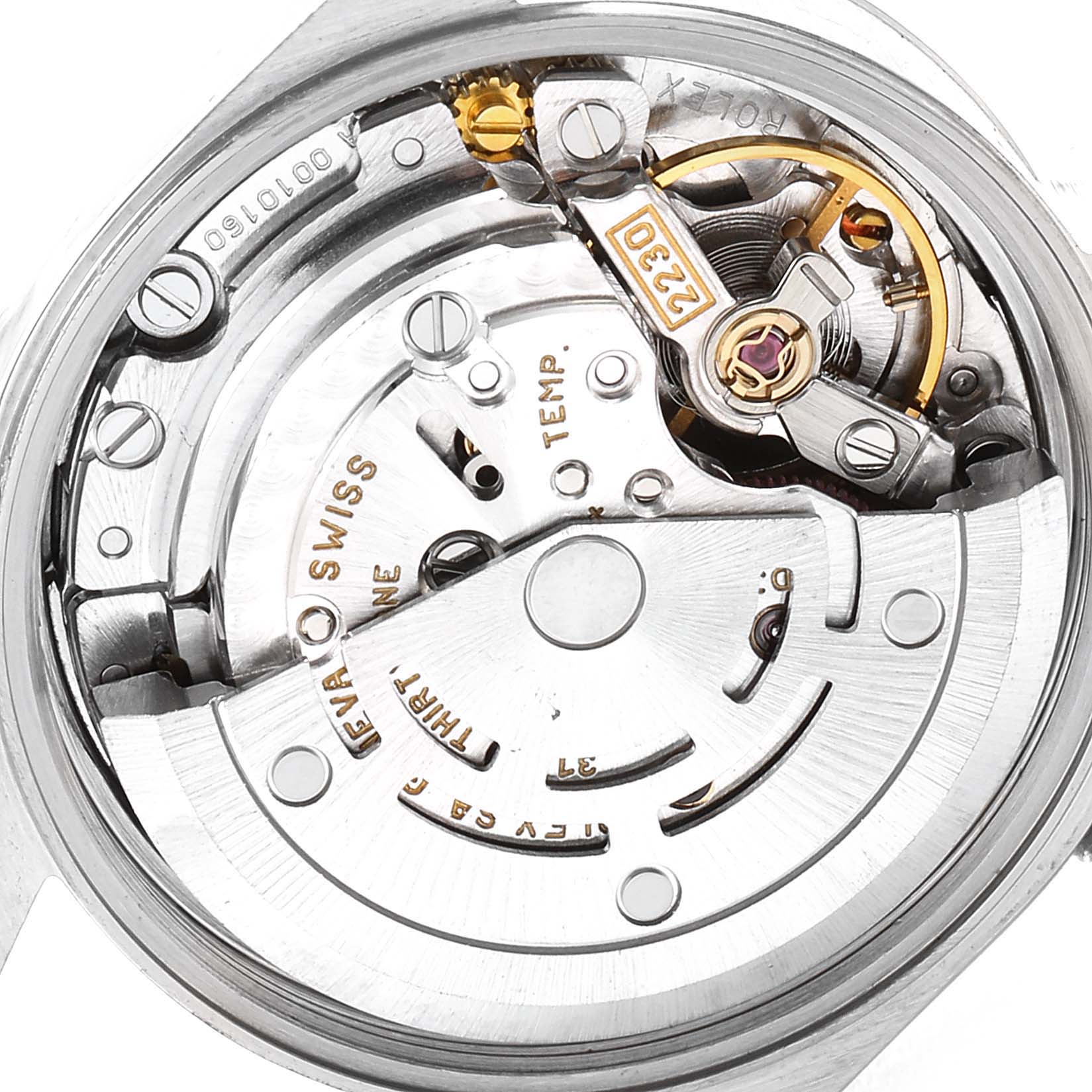 The image shows the intricate internal movement mechanism of a Rolex Oyster Perpetual 76080 Women
s Stainless Steel Blue Dial 76080 Women
s Stainless Steel Blue Dial watch, viewed from the back.