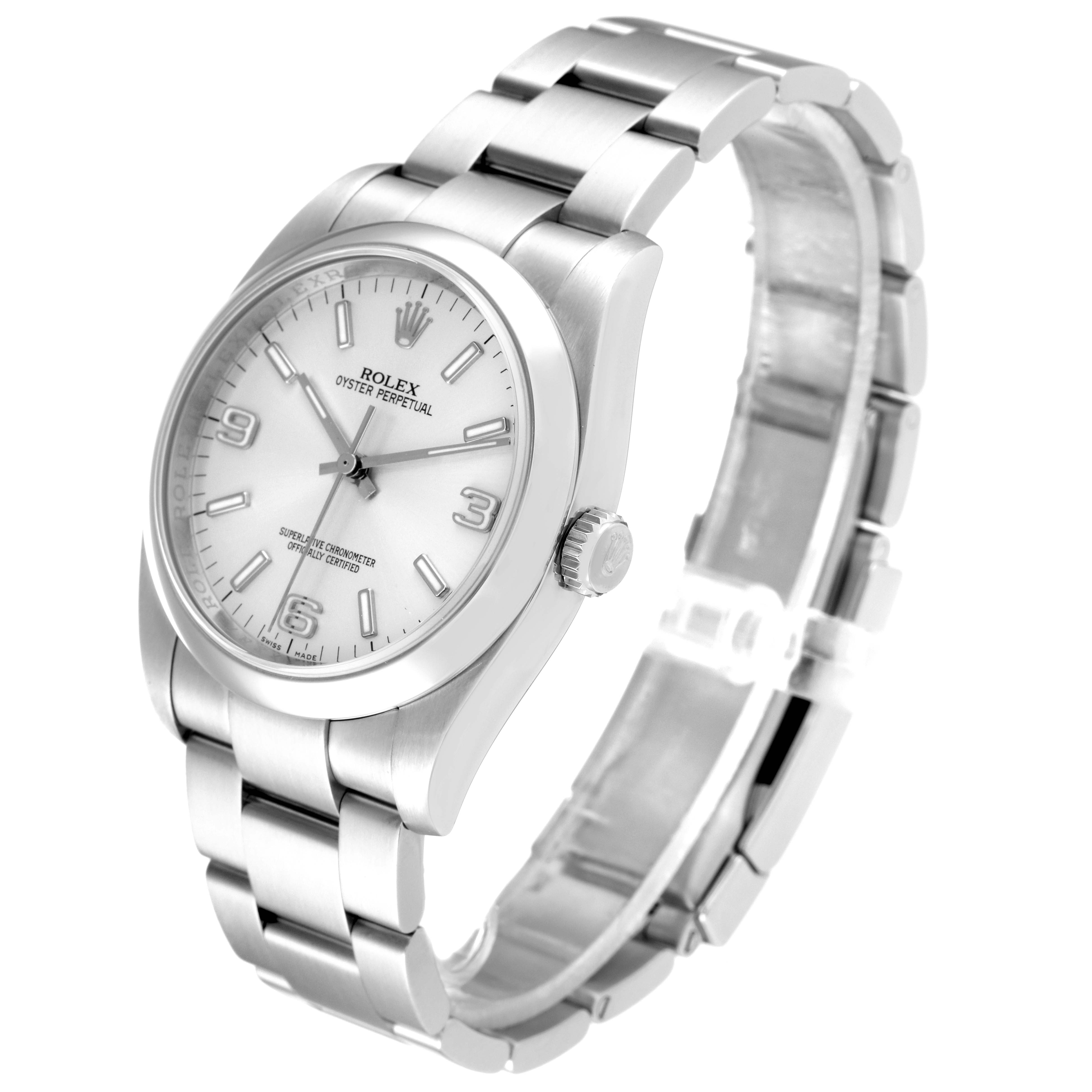 The Rolex Oyster Perpetual 116000 Men's Stainless Steel Silver Dial 116000 Men's Stainless Steel Silver Dial watch is shown at an angle displaying the face, bezel, crown, and stainless steel bracelet.