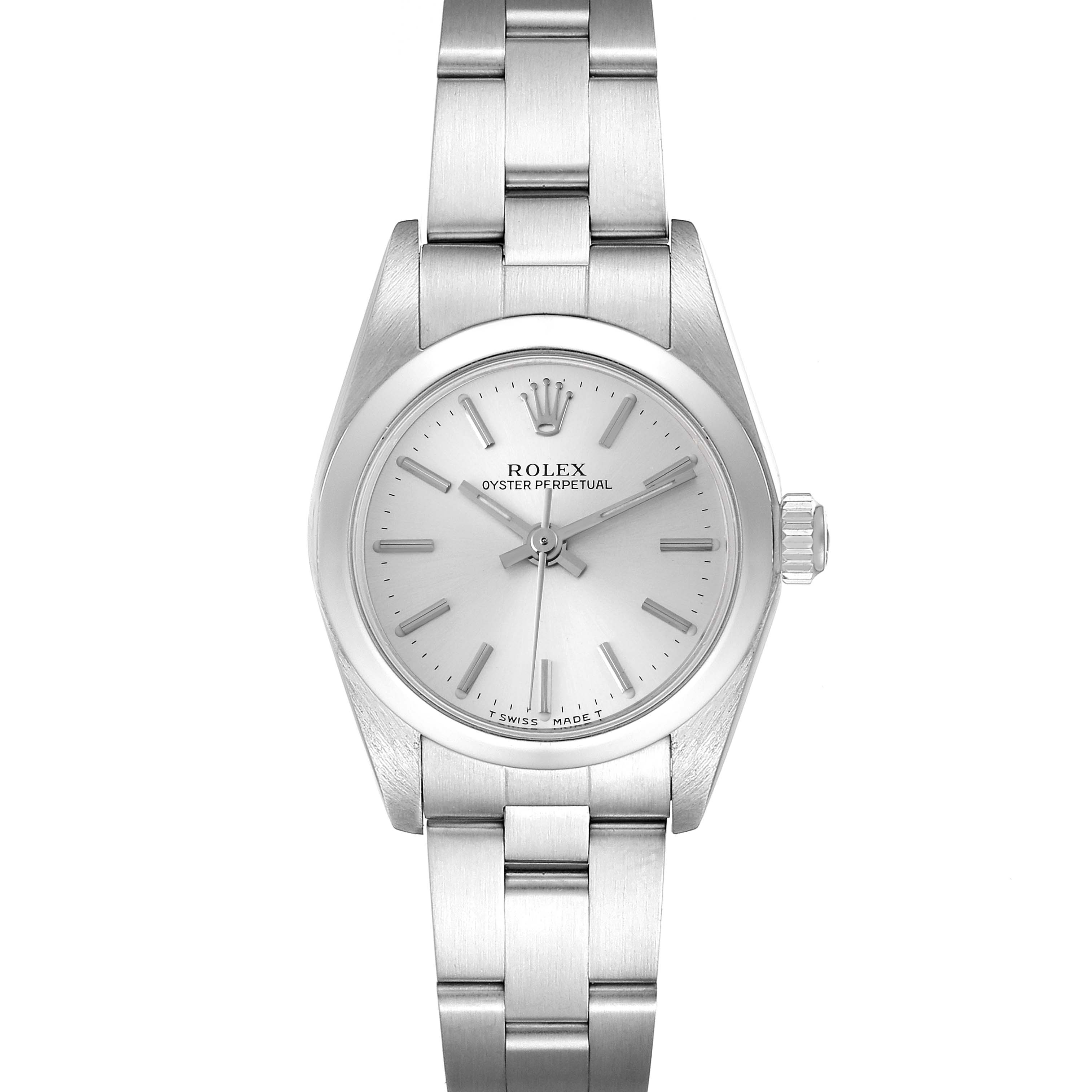 This Rolex Oyster Perpetual 76080 Women
s Stainless Steel Silver Dial 76080 Women
s Stainless Steel Silver Dial watch is shown from a top-down angle, highlighting the face, bezel, and bracelet.