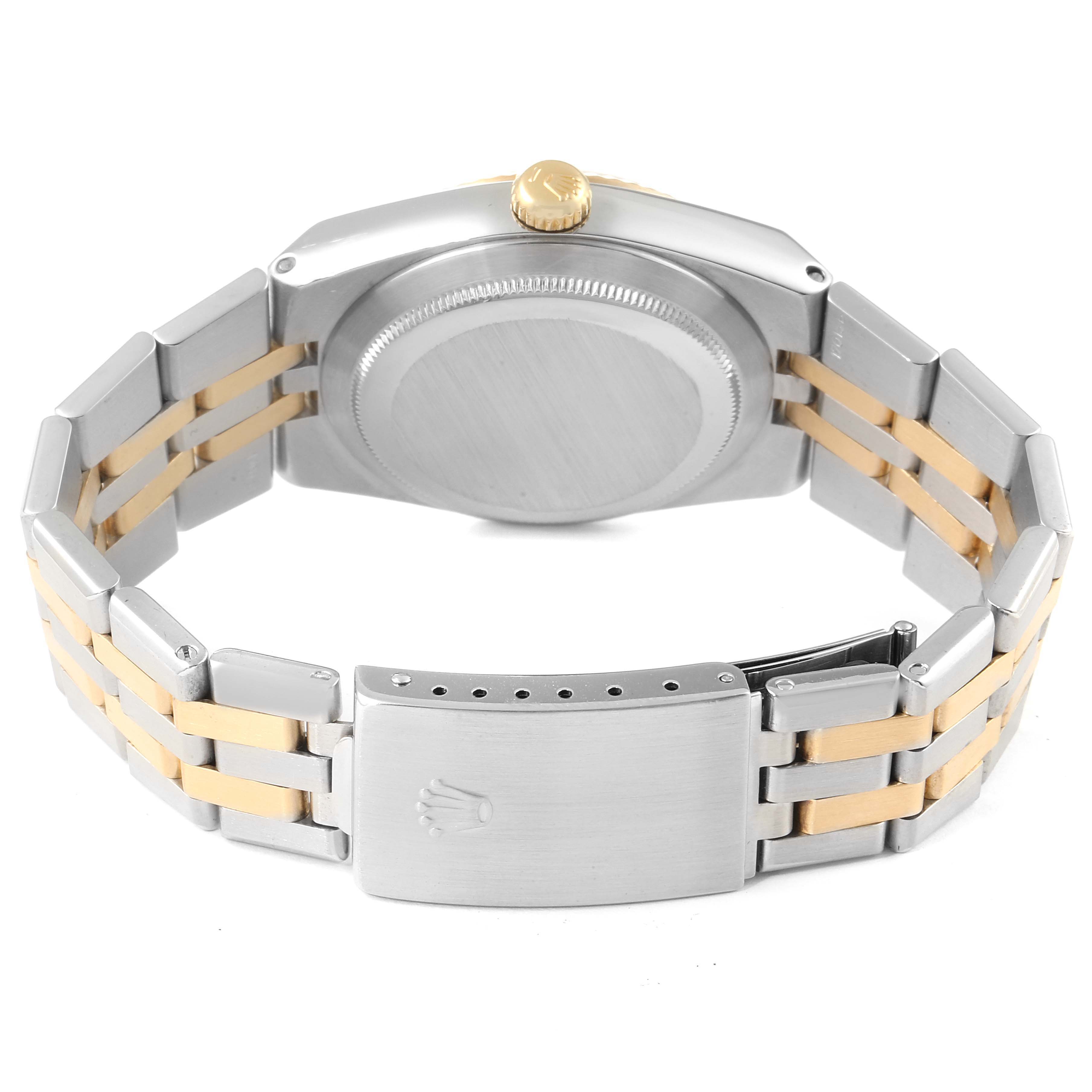 The image shows the back and clasp of the Rolex Oysterquartz 17013 Men's Steel and Gold (two tone) Champagne Dial 17013 Men's Steel and Gold (two tone) Champagne Dial watch, highlighting its gold and silver bracelet.