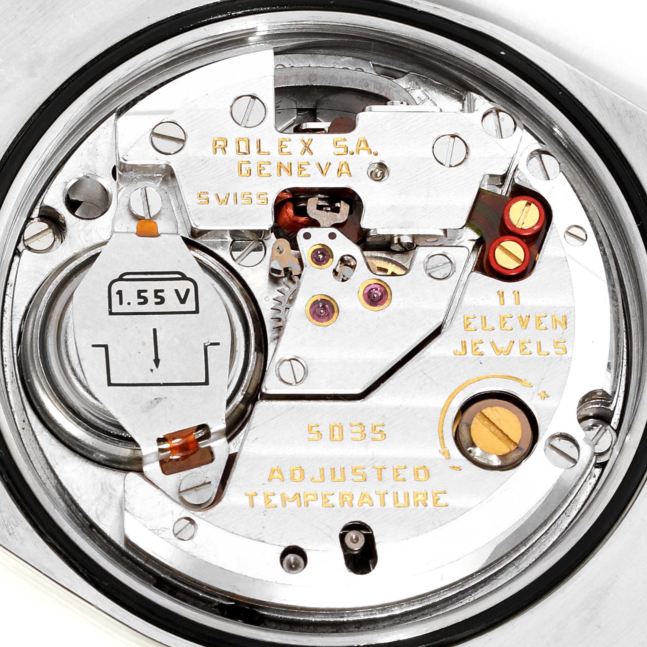 This image shows the internal mechanism of a Rolex Oysterquartz 17013 Men's Steel and Gold (two tone) Champagne Dial 17013 Men's Steel and Gold (two tone) Champagne Dial model, including the battery, jewel settings, and various engraved details.