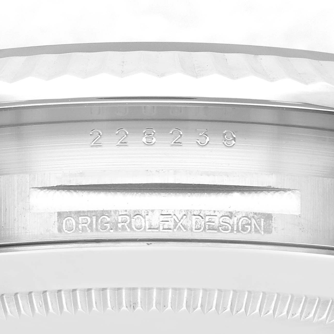 This image shows a close-up side view of the case back of a Rolex President 61522 Men's White Gold Green Dial 61522 Men's White Gold Green Dial model, displaying the serial number and "ORIG ROLEX DESIGN" engraving.