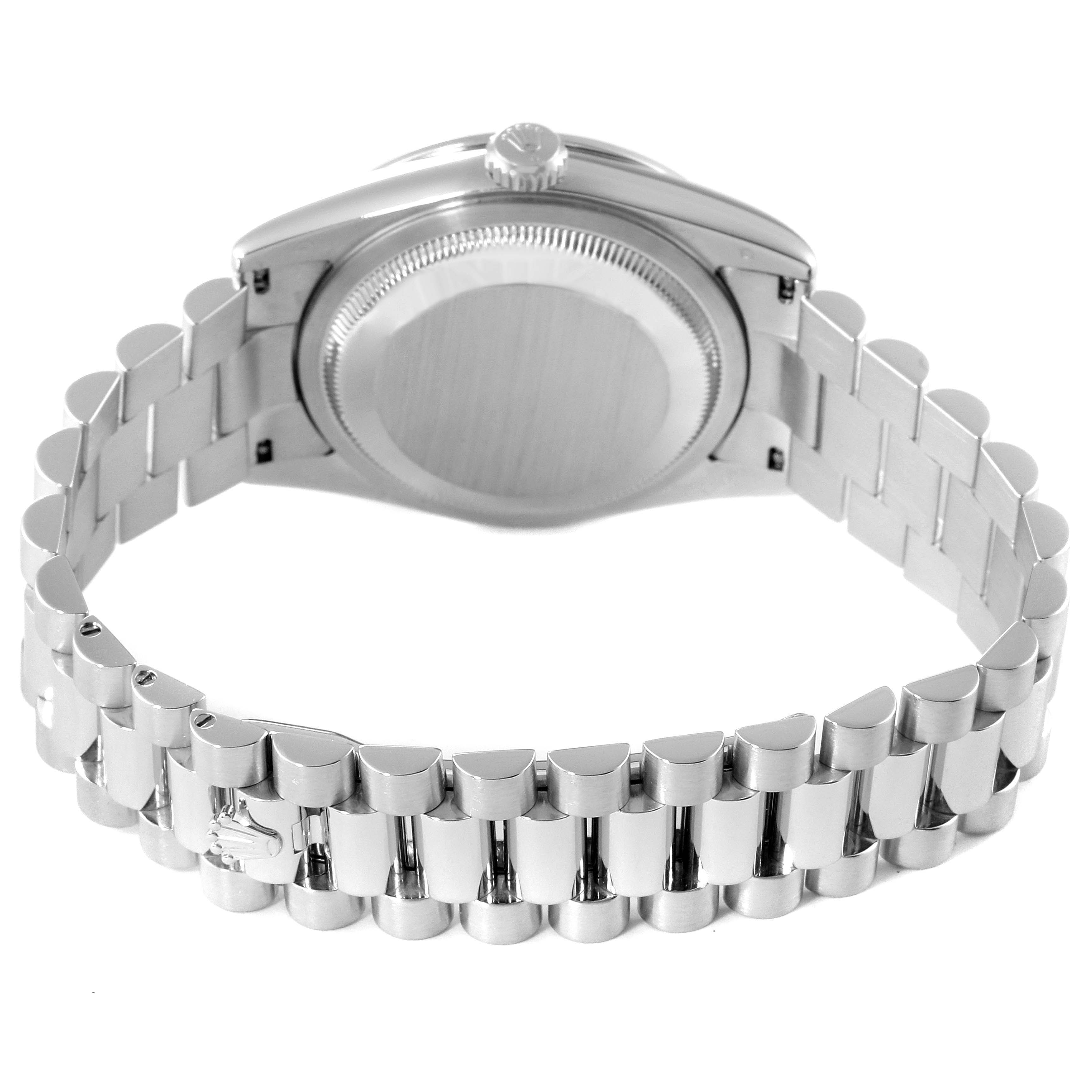 This image shows the back case and bracelet of a Rolex President 118346 Men's Platinum Blue Dial 118346 Men's Platinum Blue Dial model watch from a rear angle.