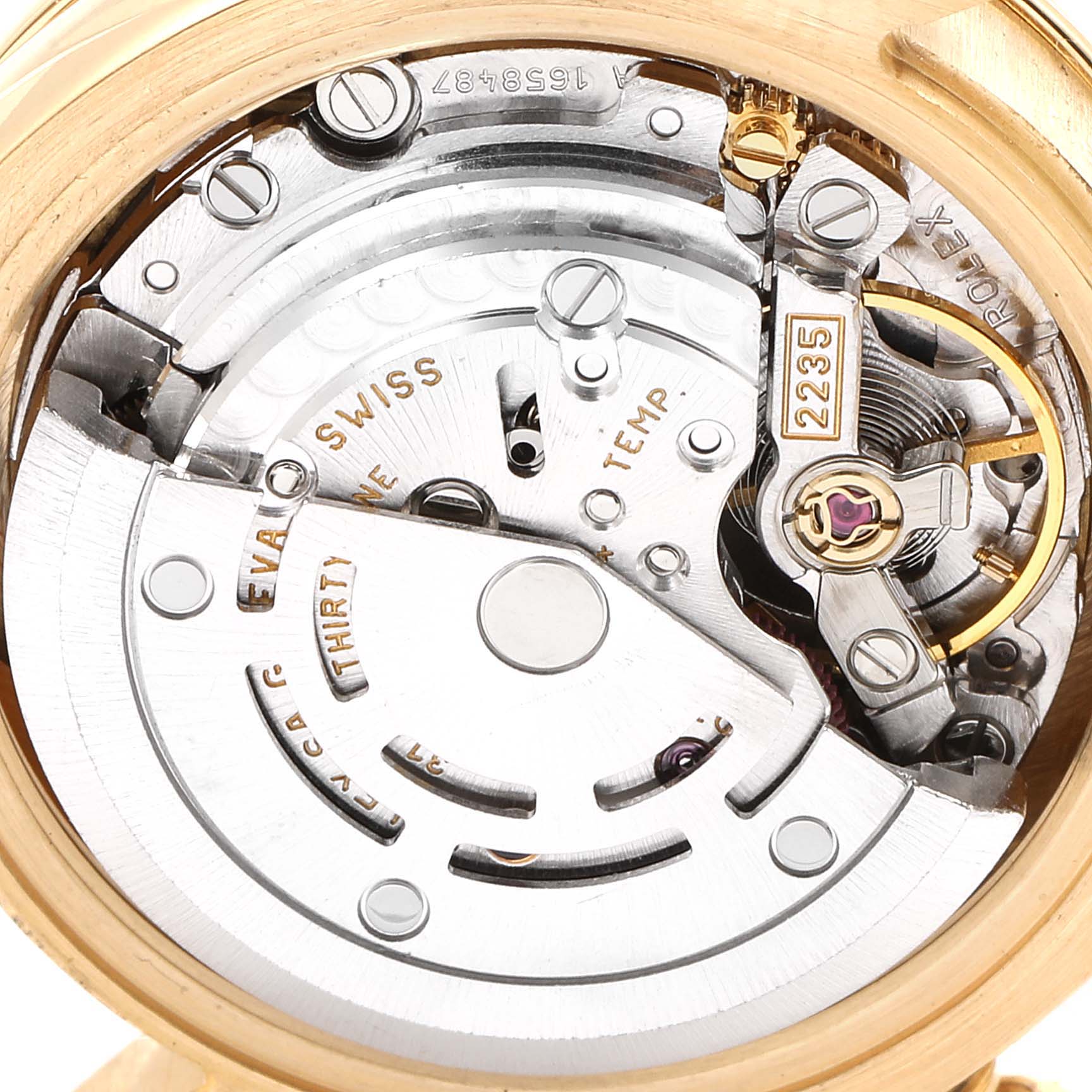 This close-up image showcases the internal movement mechanism of a Rolex President 179138 Women
s Yellow Gold Mother of Pearl Dial 179138 Women
s Yellow Gold Mother of Pearl Dial model watch.