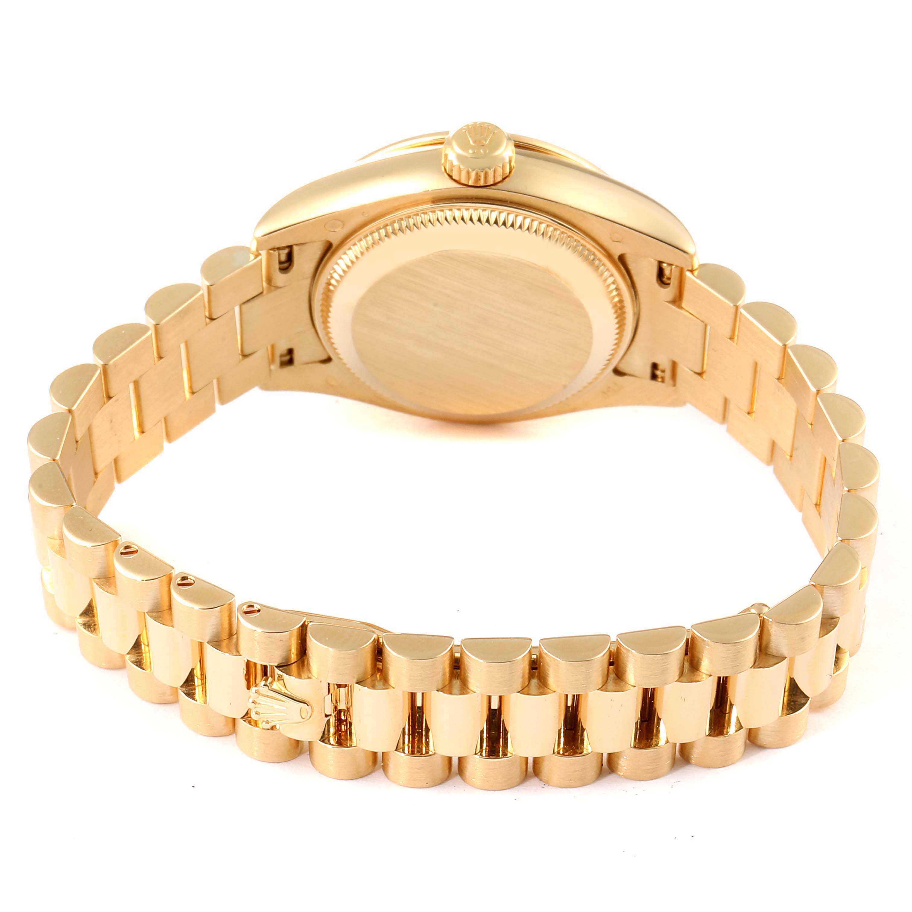 This image shows the back view of a Rolex President 179138 Women
s Yellow Gold Mother of Pearl Dial 179138 Women
s Yellow Gold Mother of Pearl Dial model watch, highlighting the case back and bracelet.