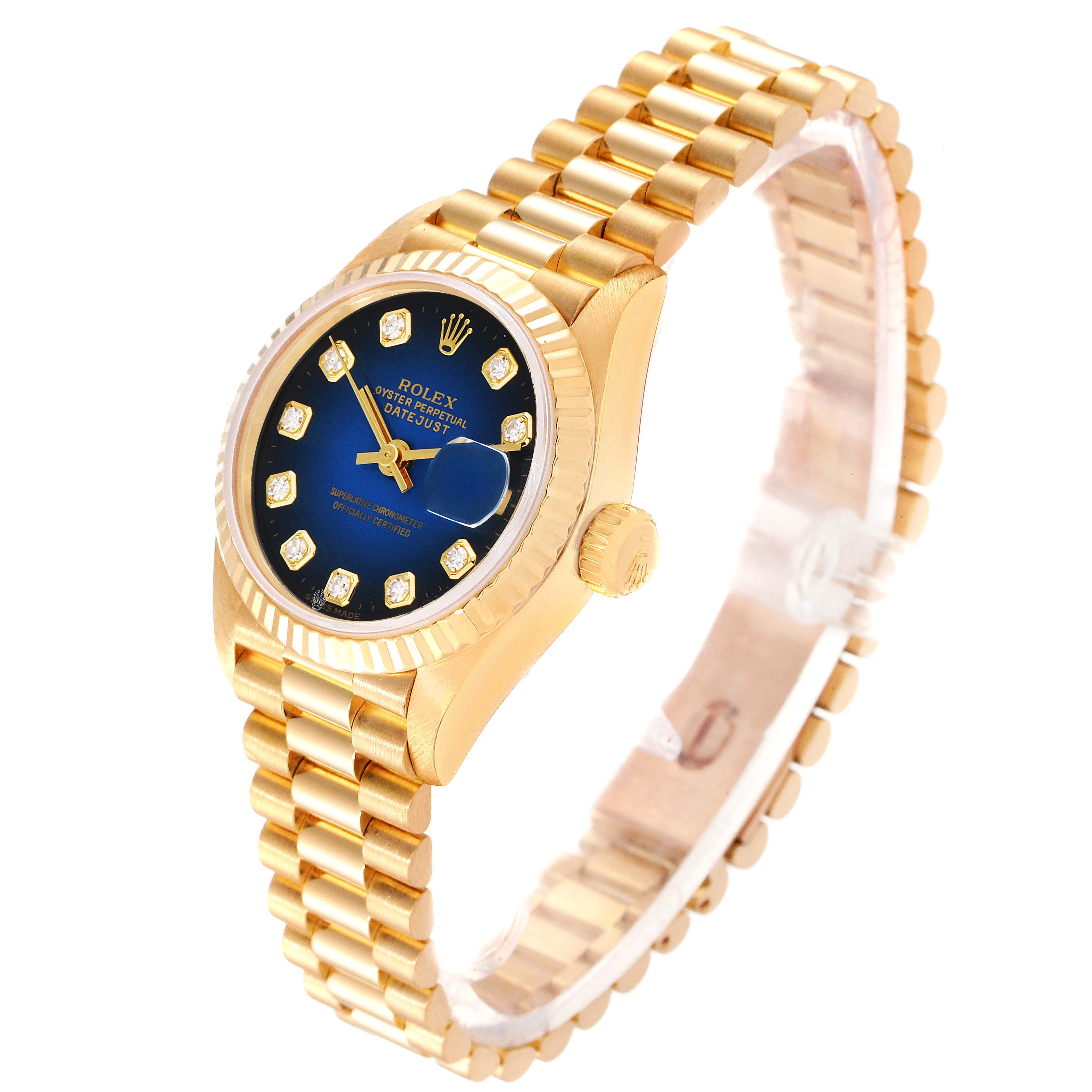 The Rolex President 69178 Women's Yellow Gold Blue Dial 69178 Women's Yellow Gold Blue Dial model watch is shown at an angled view, highlighting its gold bracelet, blue dial, and diamond hour markers.