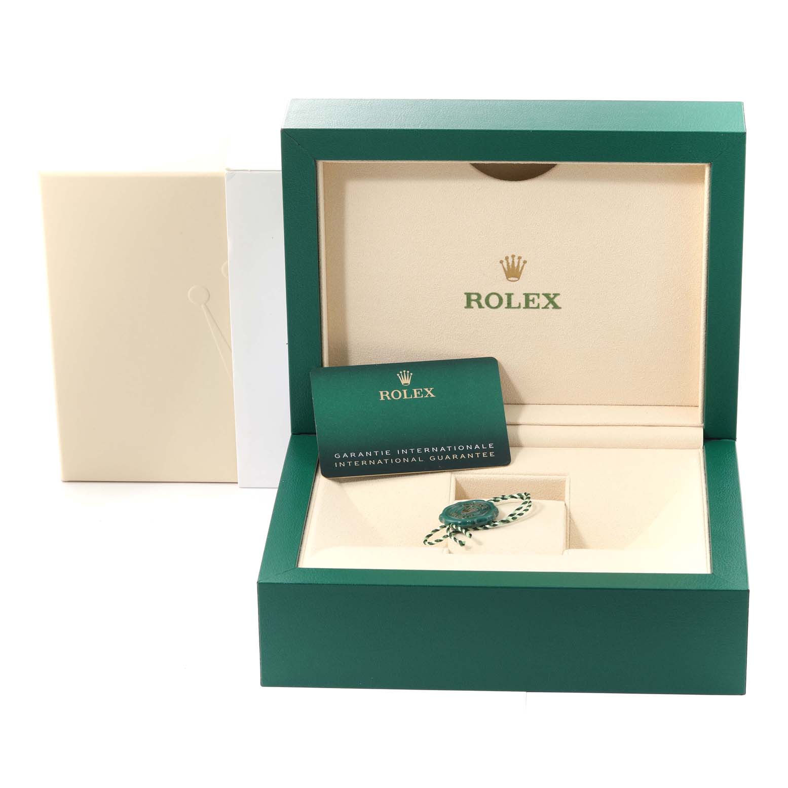 The image shows the packaging, guarantee card, and tag for the Rolex Sea-Dweller 126600 Men
s Stainless Steel Black Dial 126600 Men
s Stainless Steel Black Dial model, with the watch box open.