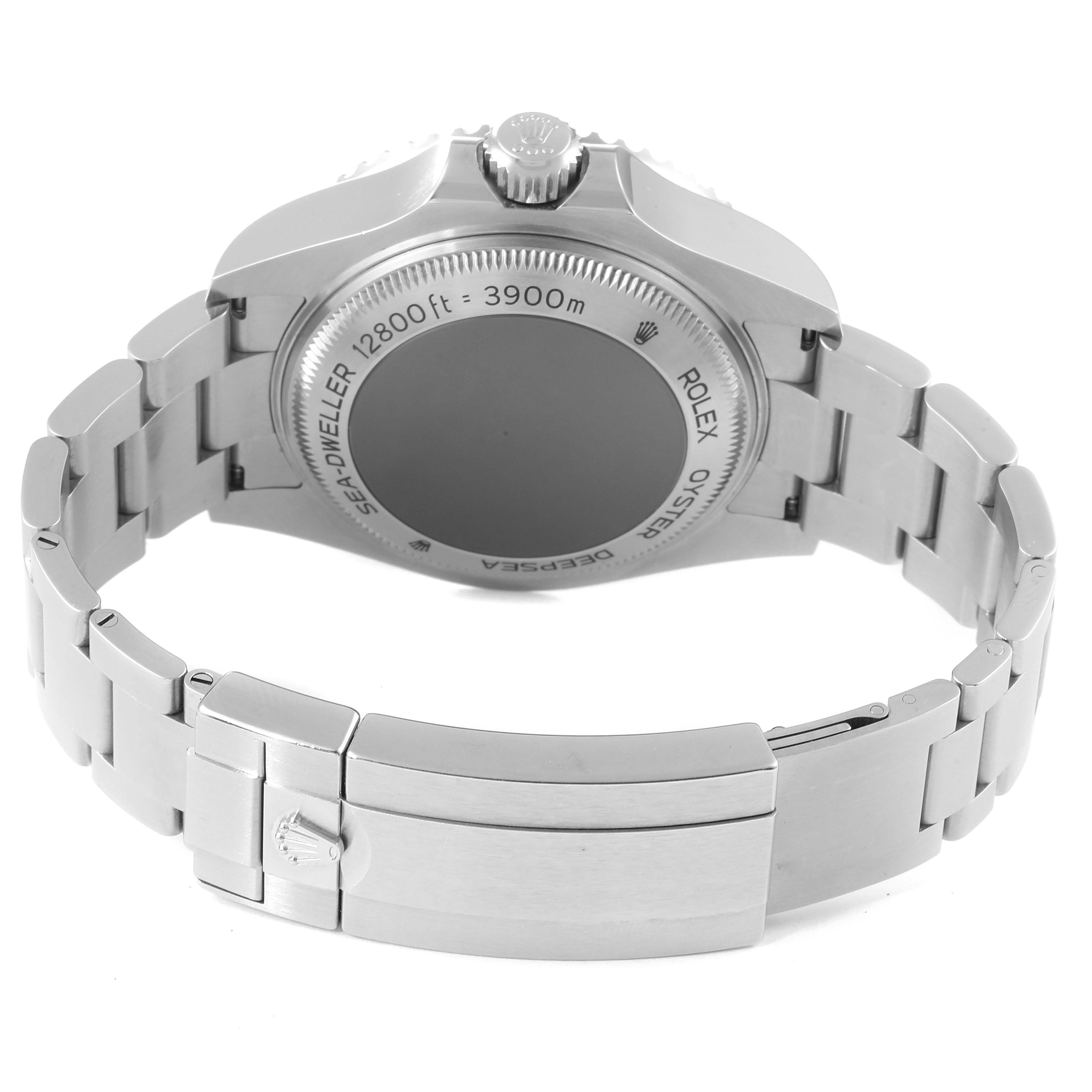 The image shows the back view of the Rolex Sea-Dweller 126660 Men
s Stainless Steel Blue Dial 126660 Men
s Stainless Steel Blue Dial watch, focusing on the case back, bracelet, and clasp.