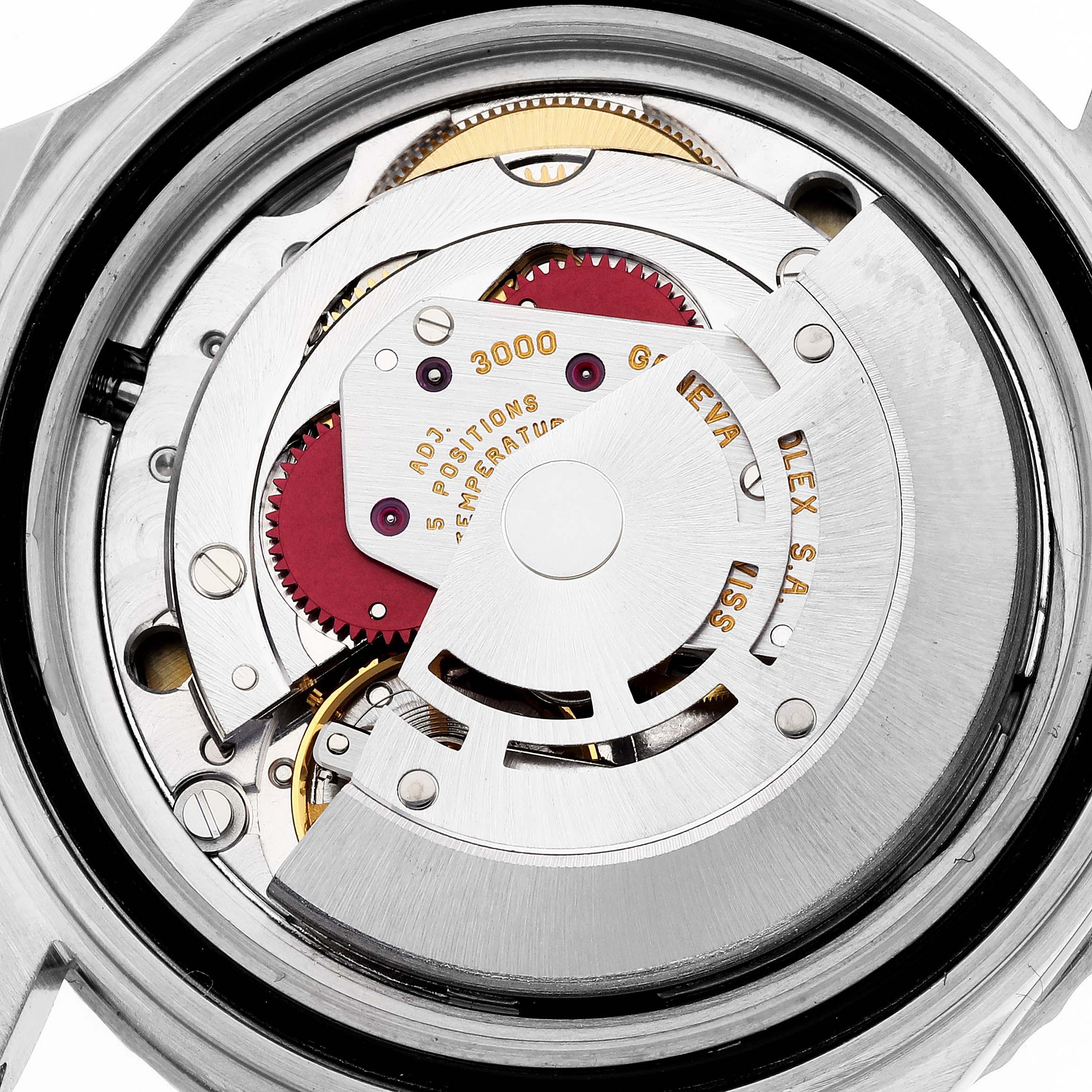 The image shows a close-up of the movement inside a Rolex Submariner 14060 Men
s Stainless Steel Black Dial 14060 Men
s Stainless Steel Black Dial watch.