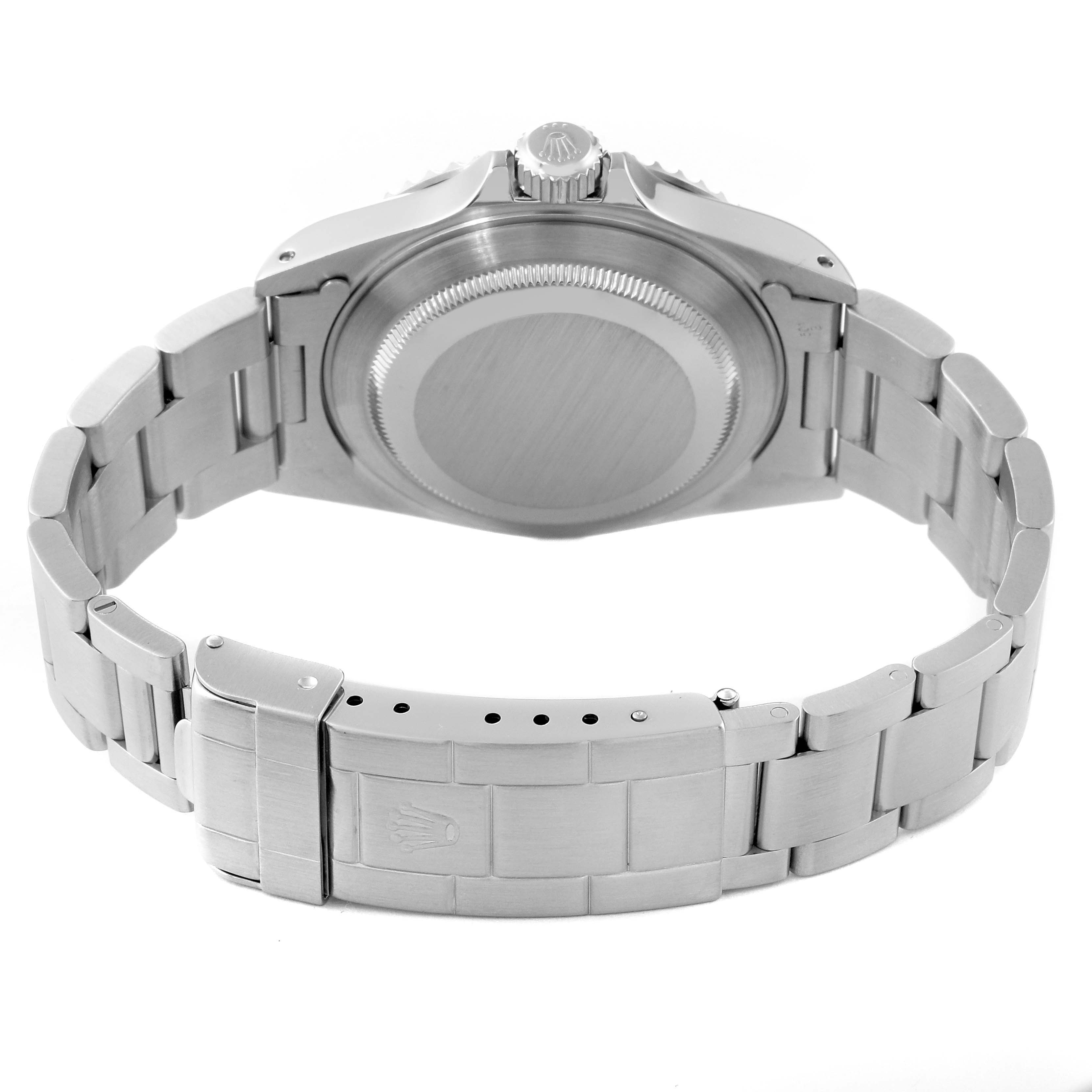 The image shows the back case and stainless steel bracelet of a Rolex Submariner 14060 Men
s Stainless Steel Black Dial 14060 Men
s Stainless Steel Black Dial watch.