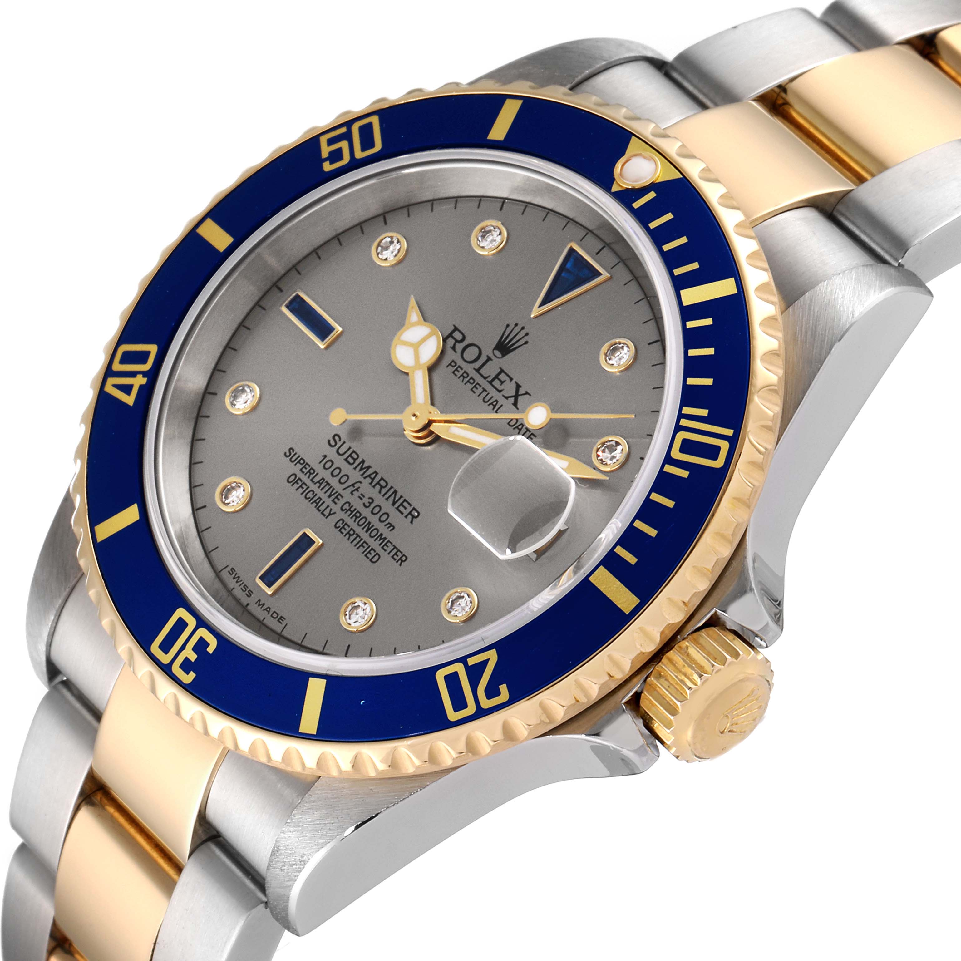 The image shows a Rolex Submariner 16613 Men
s Steel and Gold (two tone) Grey Dial 16613 Men
s Steel and Gold (two tone) Grey Dial model at an oblique angle, highlighting its bezel, crown, and part of the bracelet.