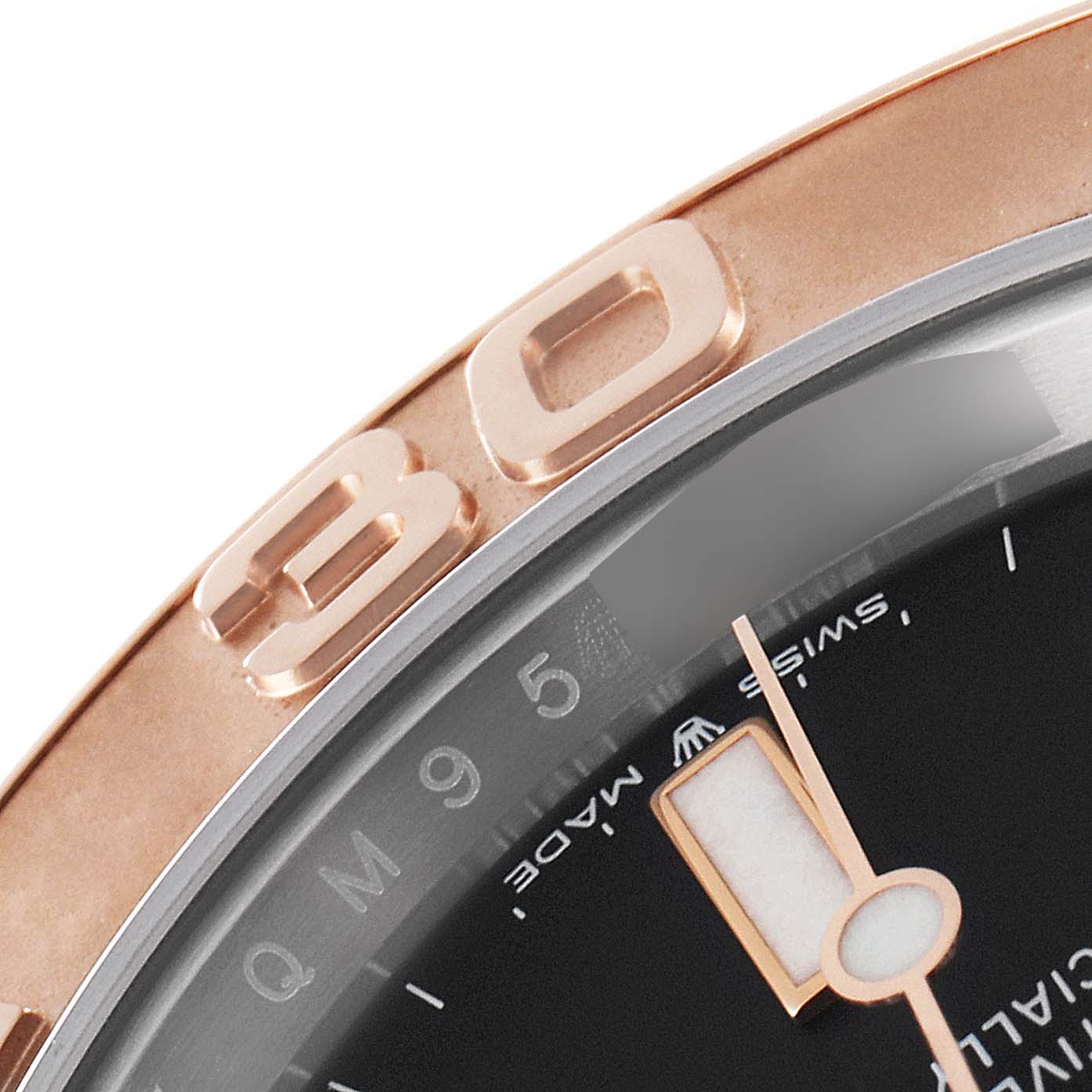 The image shows a close-up of the bezel, dial, and hands of a Rolex Yacht-Master 126621 Men's Steel and Gold (two tone) Black Dial 126621 Men's Steel and Gold (two tone) Black Dial model watch.