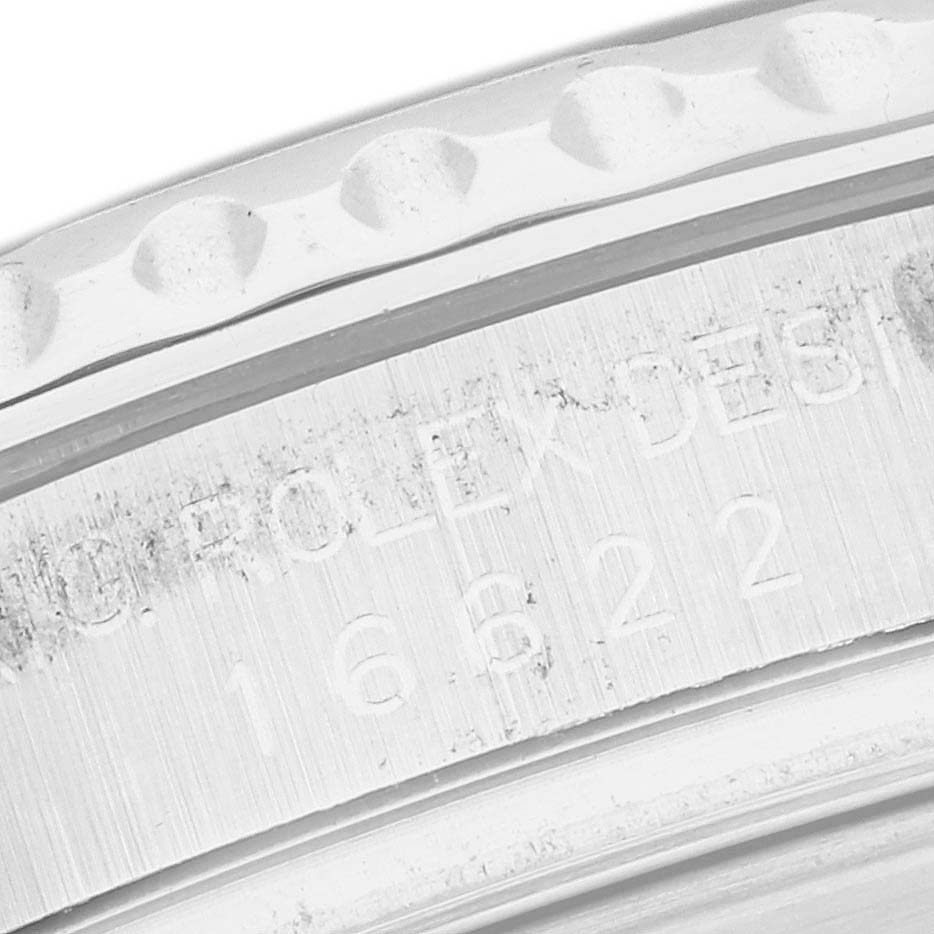The image shows a close-up angle of the Rolex Yacht-Master 16622 Men's Stainless Steel Silver Dial 16622 Men's Stainless Steel Silver Dial model's bezel and engraved model number.