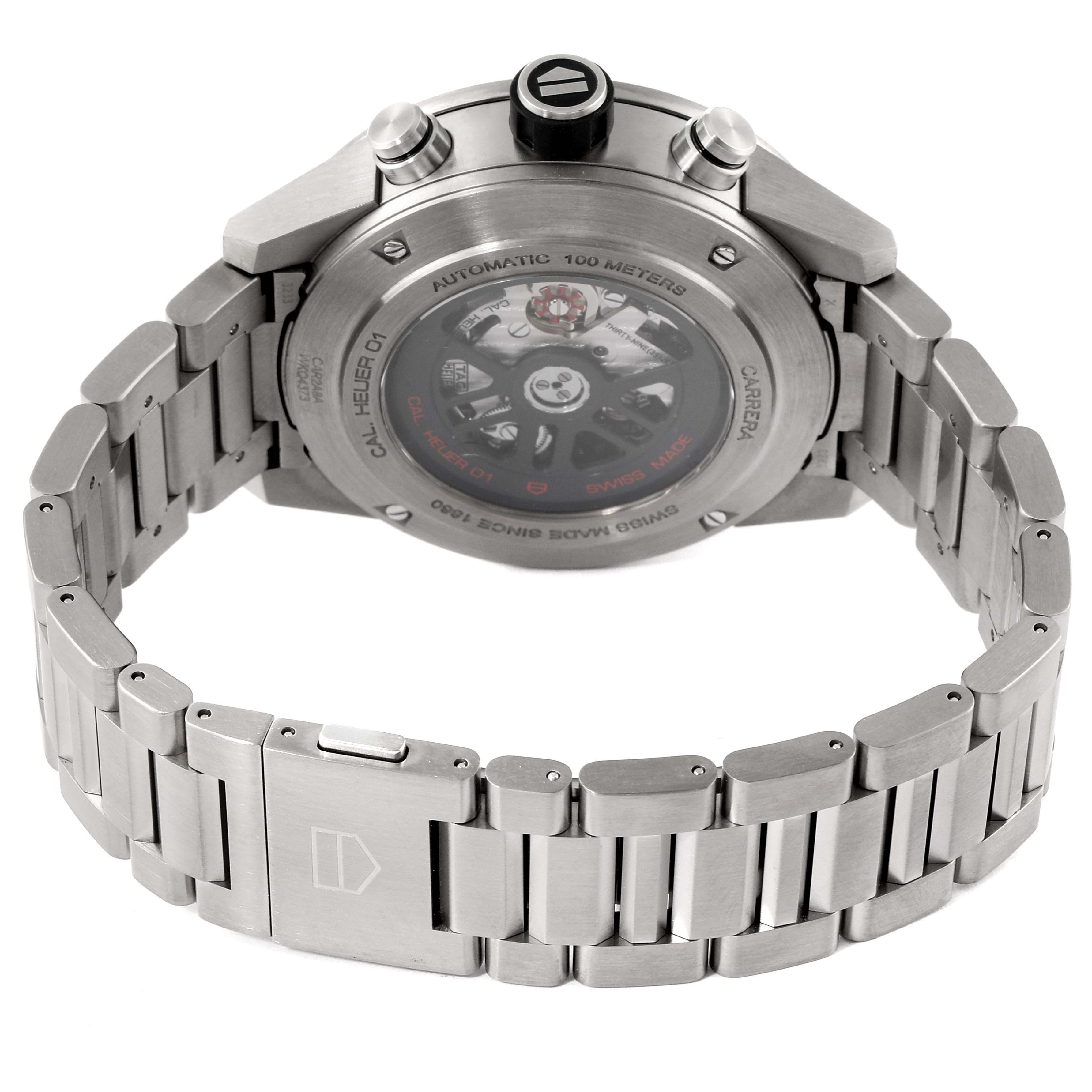 The image shows the back view of the Tag Heuer Carrera CAR2A8A.FT6072 Men's Titanium Grey Dial CAR2A8A.FT6072 Men's Titanium Grey Dial watch, highlighting its stainless steel case, bracelet, and transparent case back.