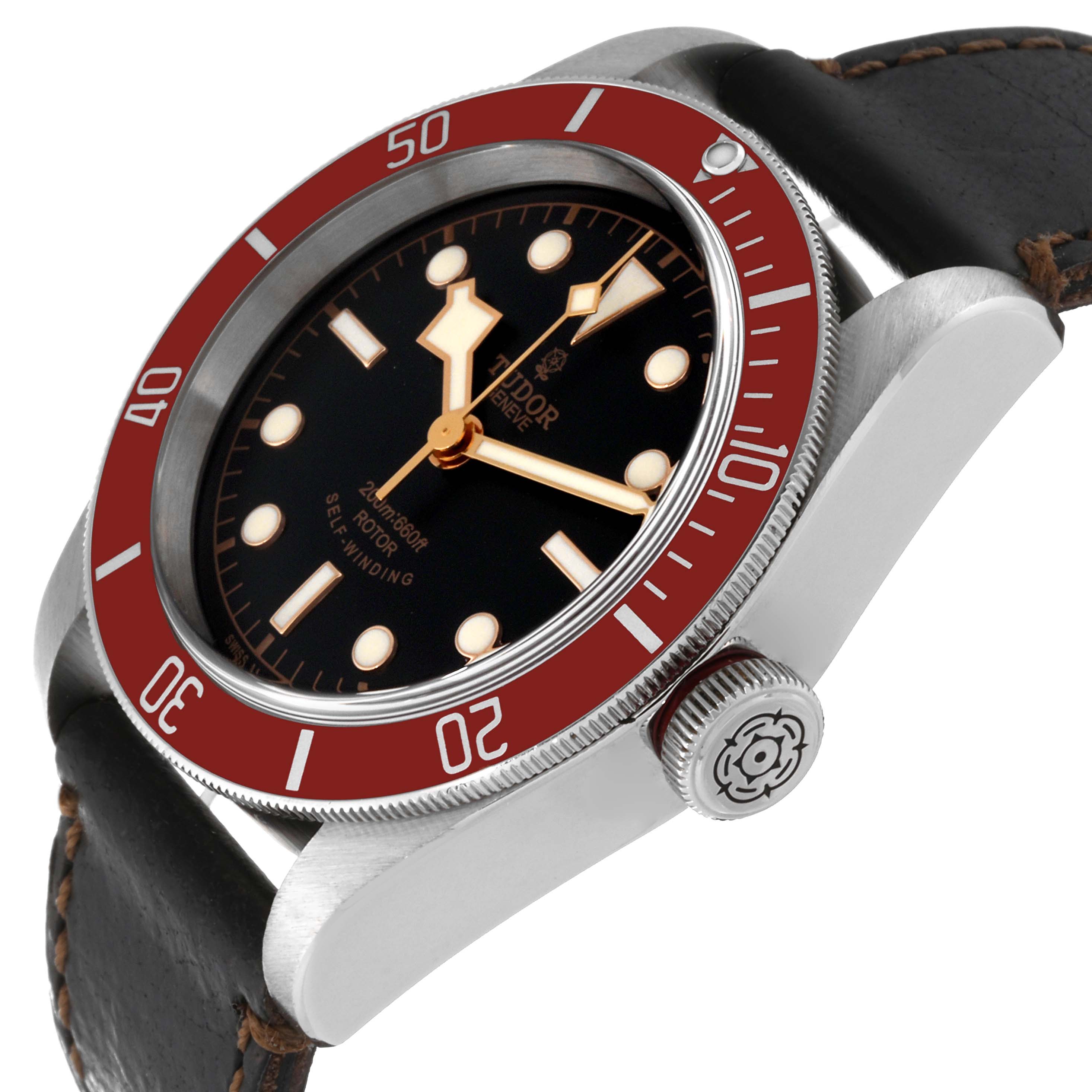 This image shows a side angle of a Tudor Heritage Black Bay 79220R Men
s Stainless Steel Black Dial 79220R Men
s Stainless Steel Black Dial watch, highlighting the bezel, face, case, and crown.