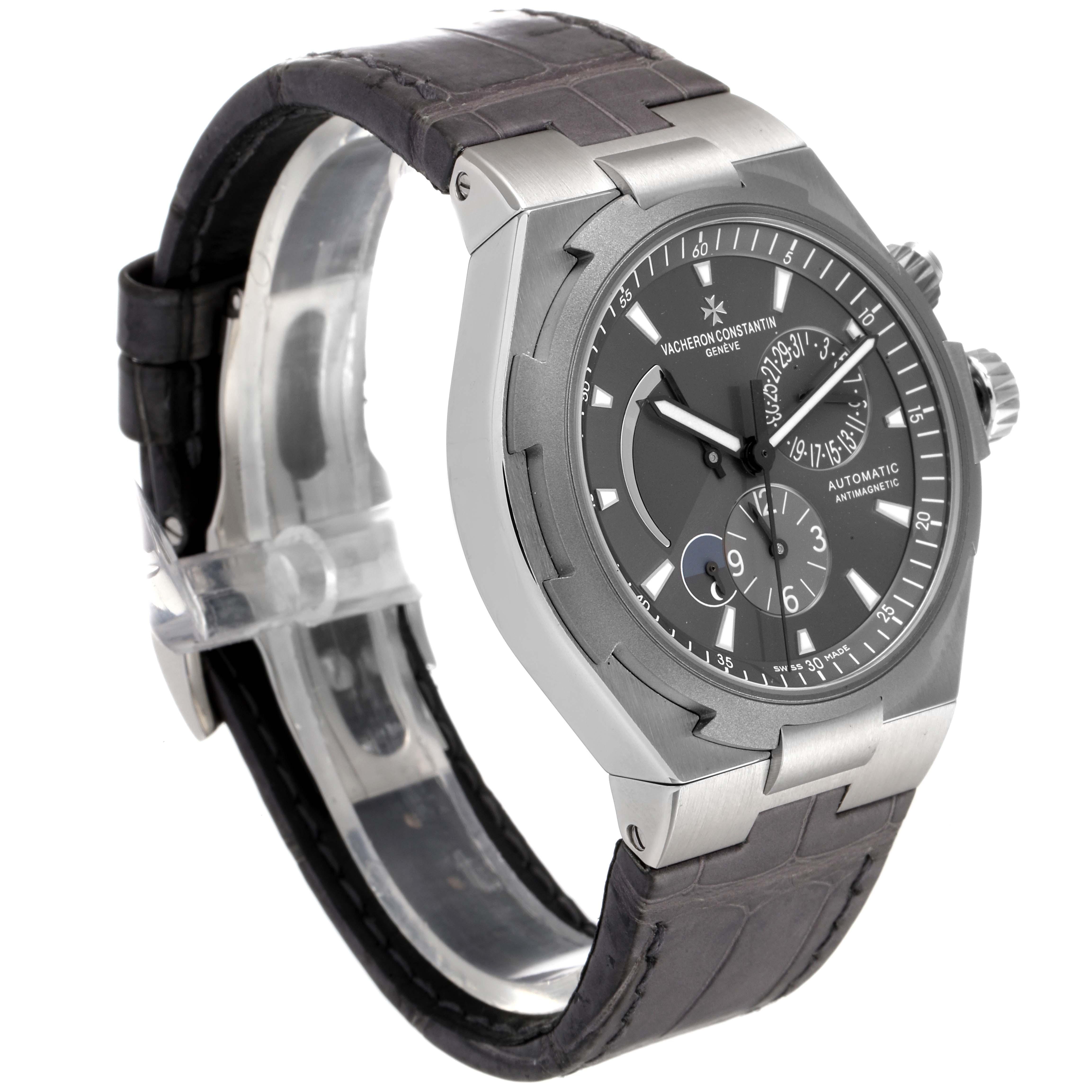 The image shows a side angle of the Vacheron Constantin Overseas 47450/000W-9511 Men's Stainless Steel Grey Dial 47450/000W-9511 Men's Stainless Steel Grey Dial watch, highlighting the dial, case, and strap.