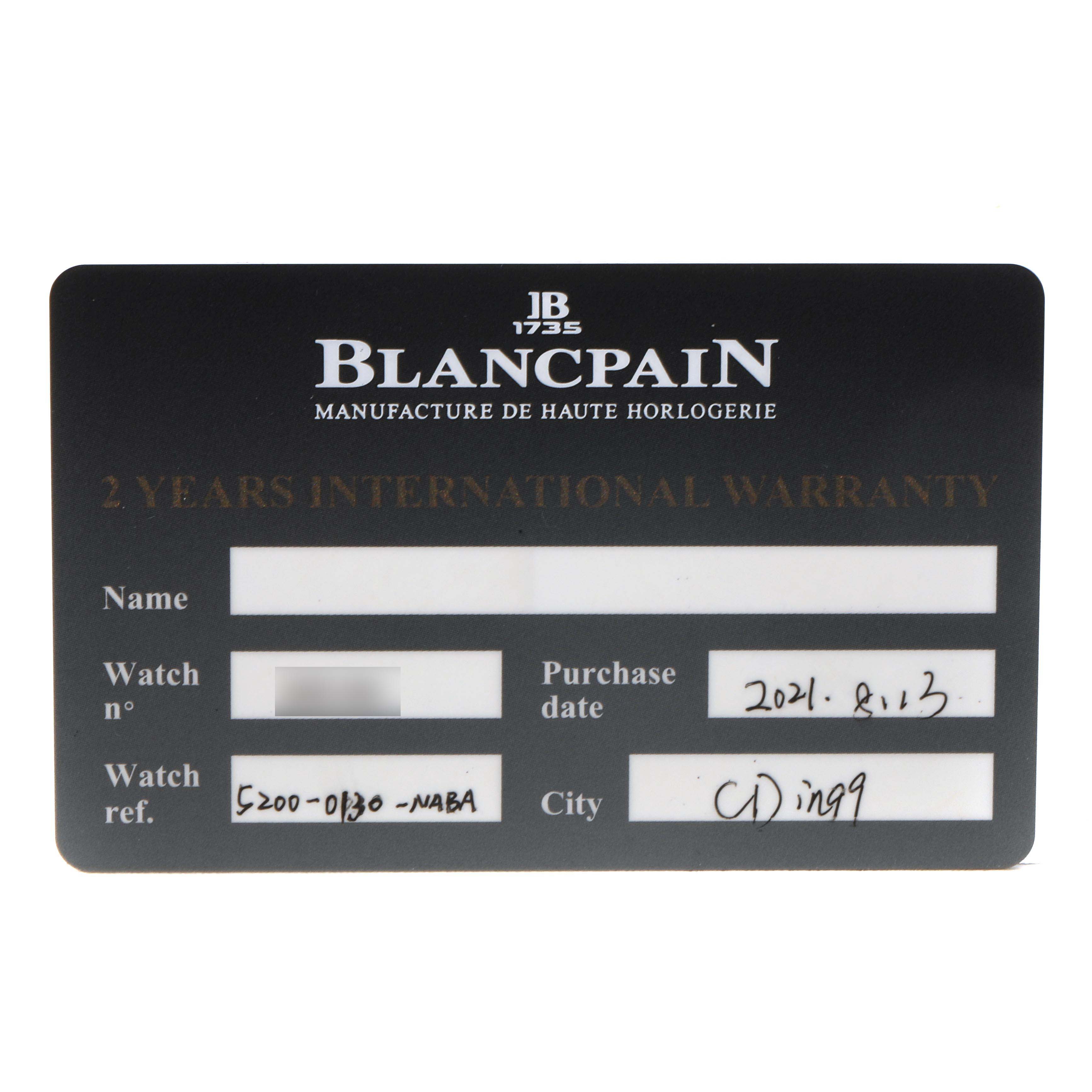 The image shows a Blancpain Fifty Fathoms 5200-0130-NABA Men's Ceramic Black Dial international warranty card.