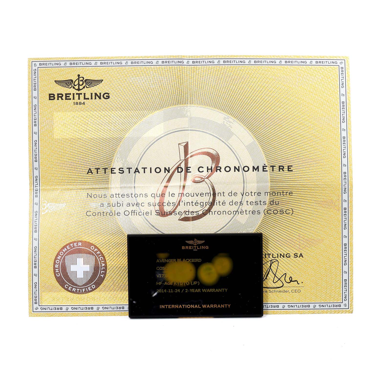 The image shows the certification and warranty papers for a Breitling Avenger V17310 Men's Titanium Black Dial V17310 Men's Titanium Black Dial model watch.