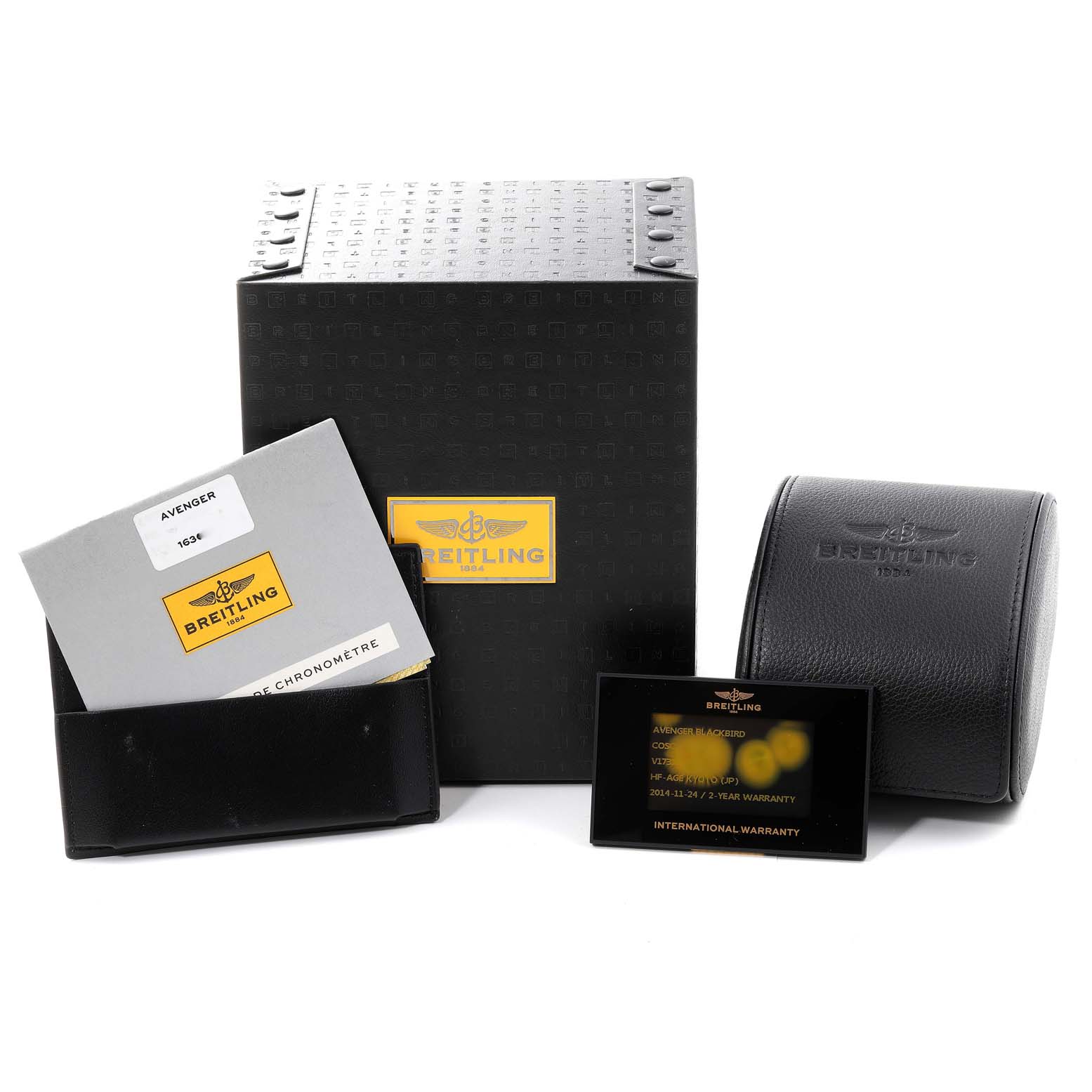 This image shows the packaging, warranty card, instruction manual, and a leather case for a Breitling Avenger V17310 Men's Titanium Black Dial V17310 Men's Titanium Black Dial watch.