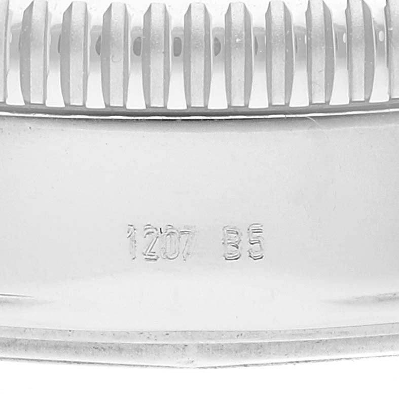 The image shows a close-up of the side profile and bezel edge of a Breitling Superocean A3732016/C735 Men's Stainless Steel Blue Dial A3732016/C735 Men's Stainless Steel Blue Dial watch, with engraved numbers visible.