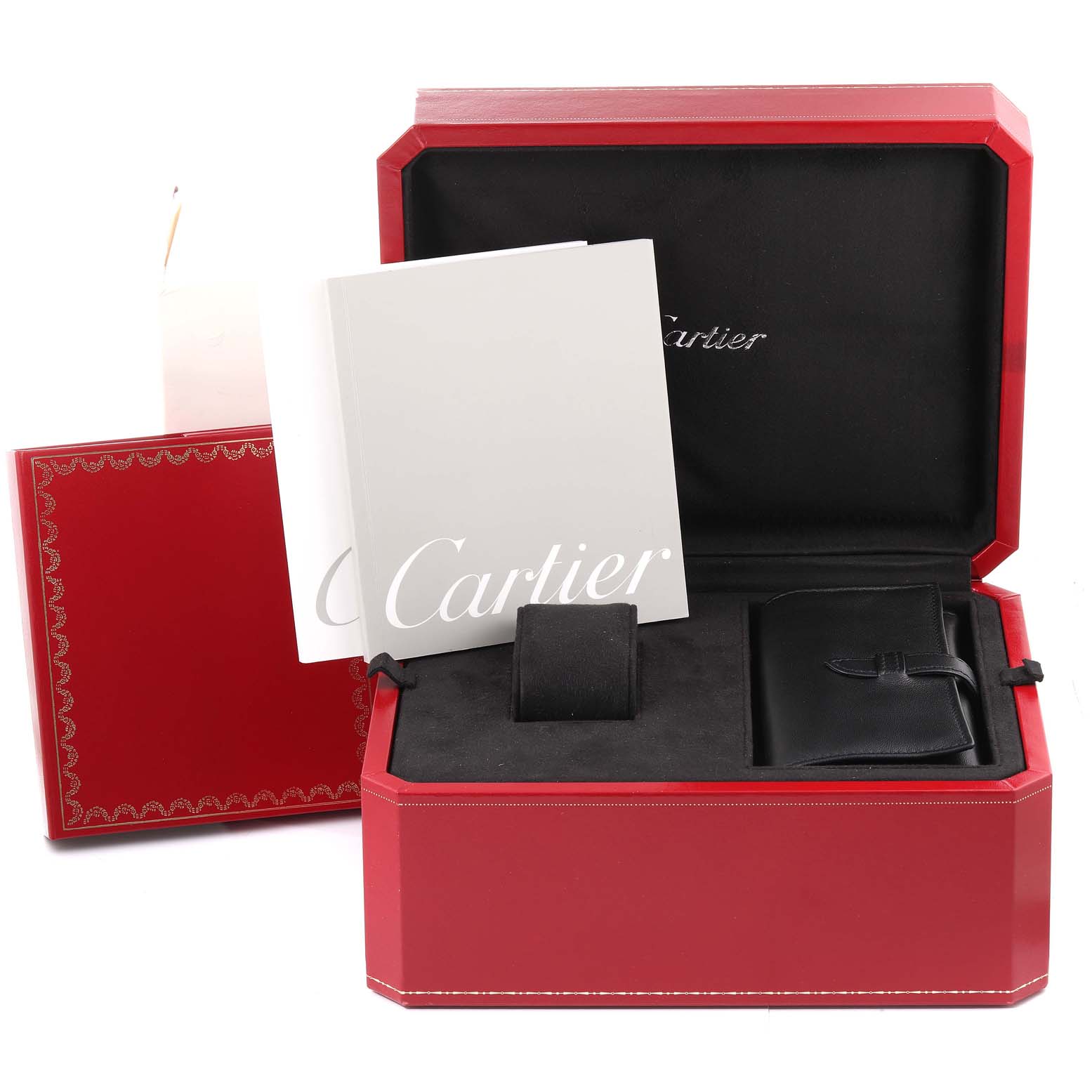 The image shows the packaging for a Cartier Roadster W62000V3 Men
s Stainless Steel Silver Dial W62000V3 Men
s Stainless Steel Silver Dial watch, including the box, booklet, and a case for accessories.