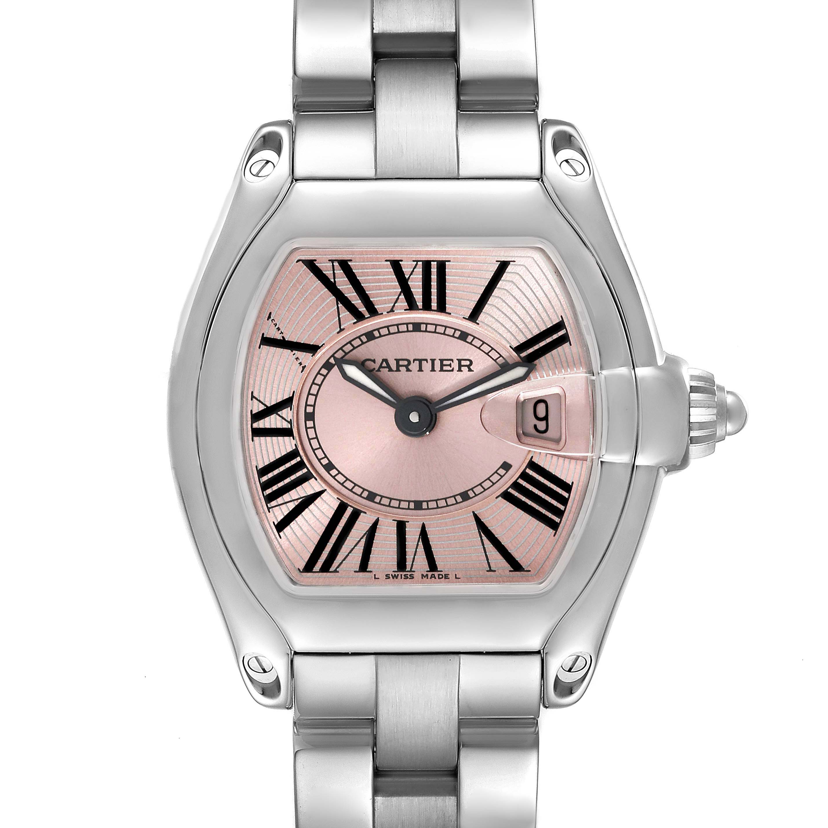 The image shows a close-up, front view of the Cartier Roadster W62017V3 Women's Stainless Steel Pink Dial W62017V3 Women's Stainless Steel Pink Dial watch displaying its pink dial, Roman numerals, and stainless steel bracelet.