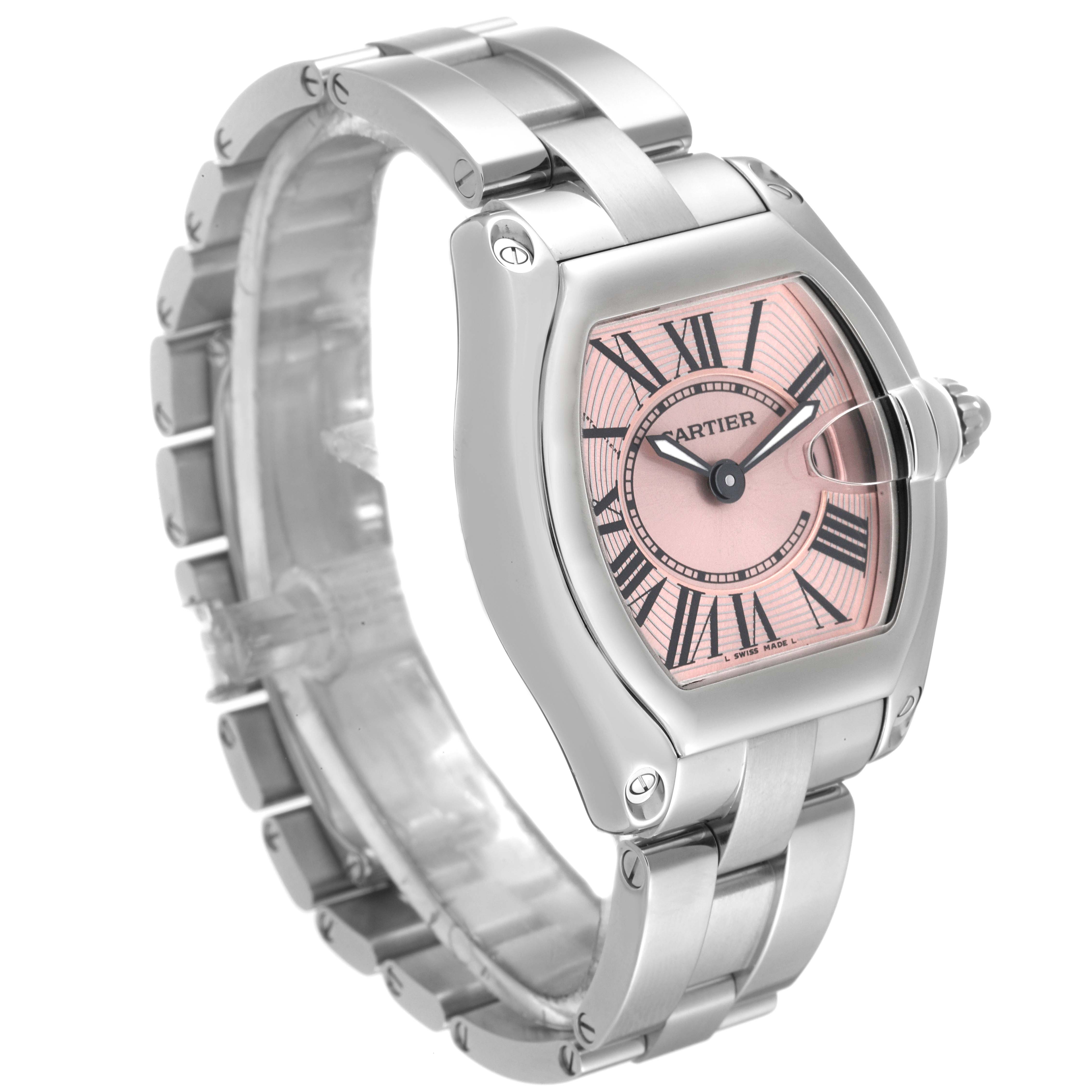 The Cartier Roadster W62017V3 Women's Stainless Steel Pink Dial W62017V3 Women's Stainless Steel Pink Dial watch is shown at a side angle, displaying its stainless steel bracelet and pink dial with Roman numerals.