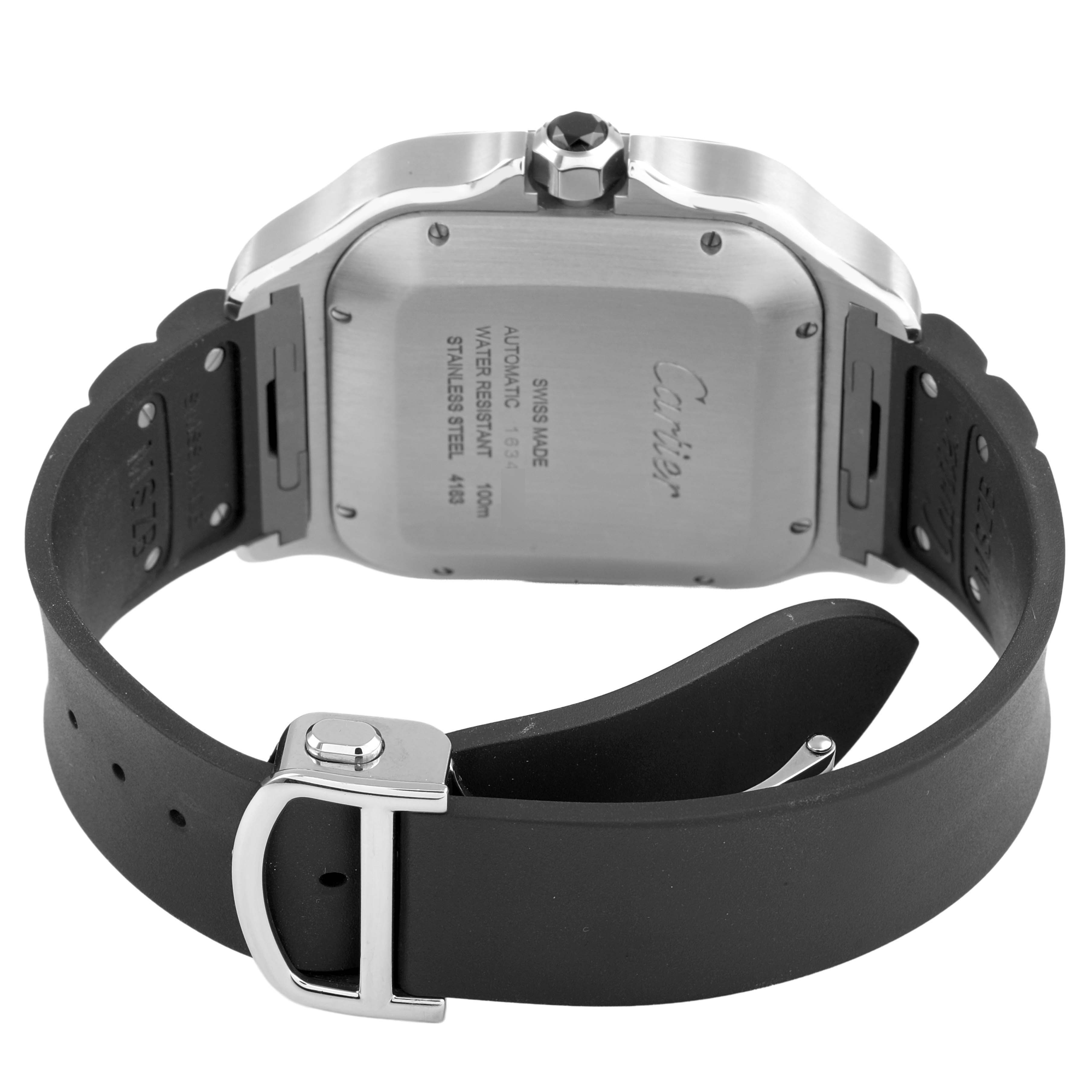 The image shows a rear angle of the Cartier Santos WSSA0017 Men's Stainless Steel Silver Dial watch, highlighting the case back, crown, and rubber strap with buckle.