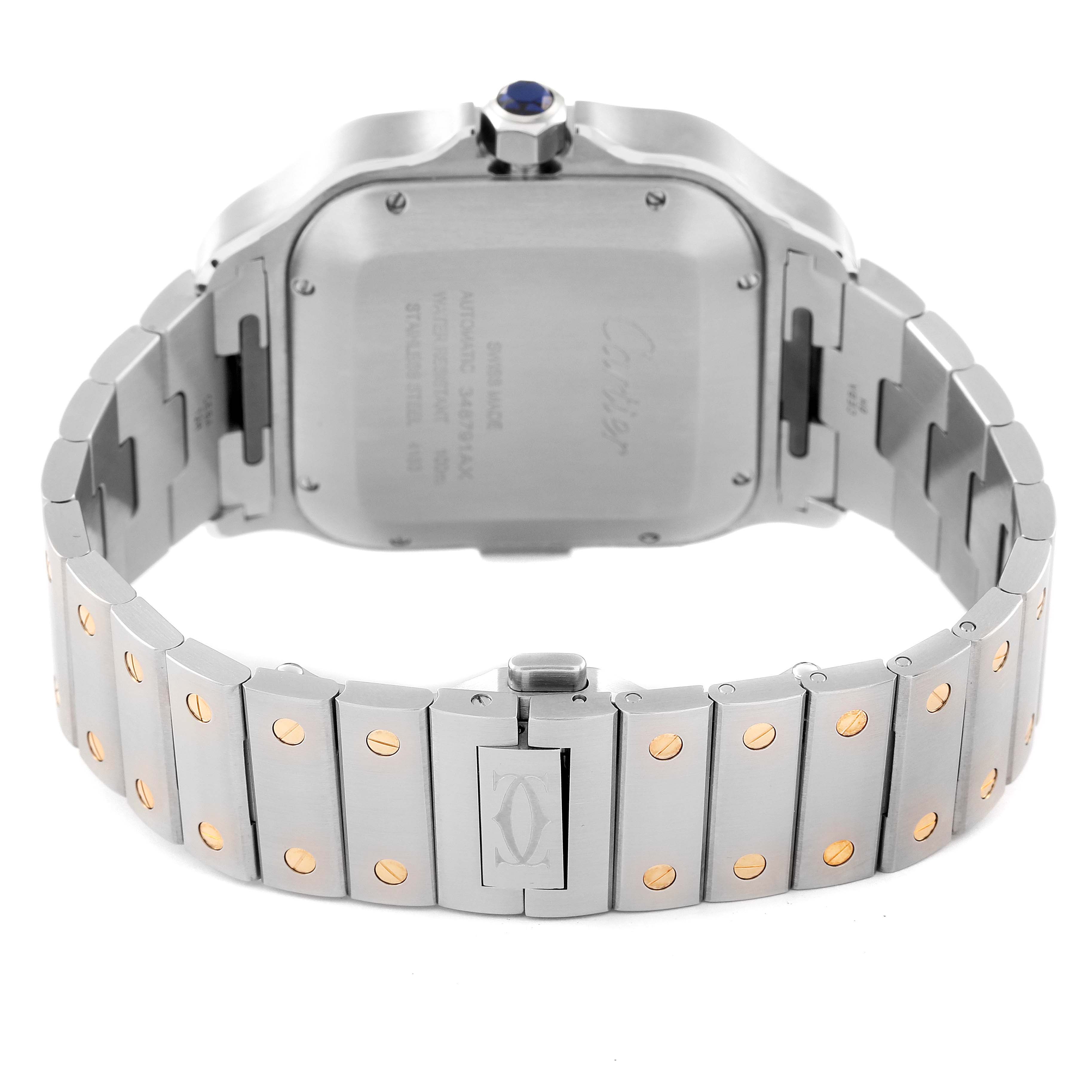 The image shows the backside of a Santos model by Cartier, focusing on the case back and part of the bracelet.