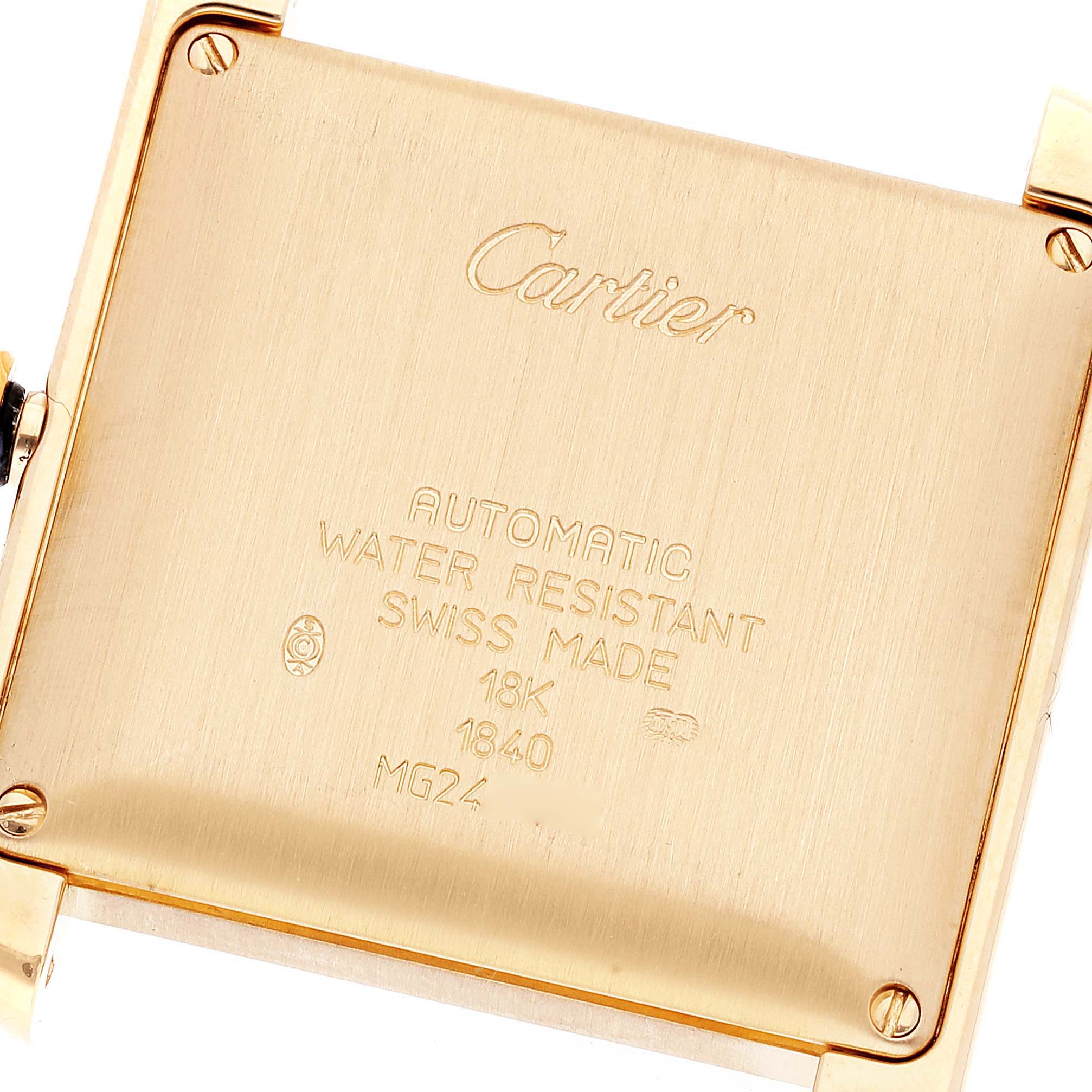 This image shows the back case of a Cartier Tank Française watch, highlighting its inscriptions and screws.