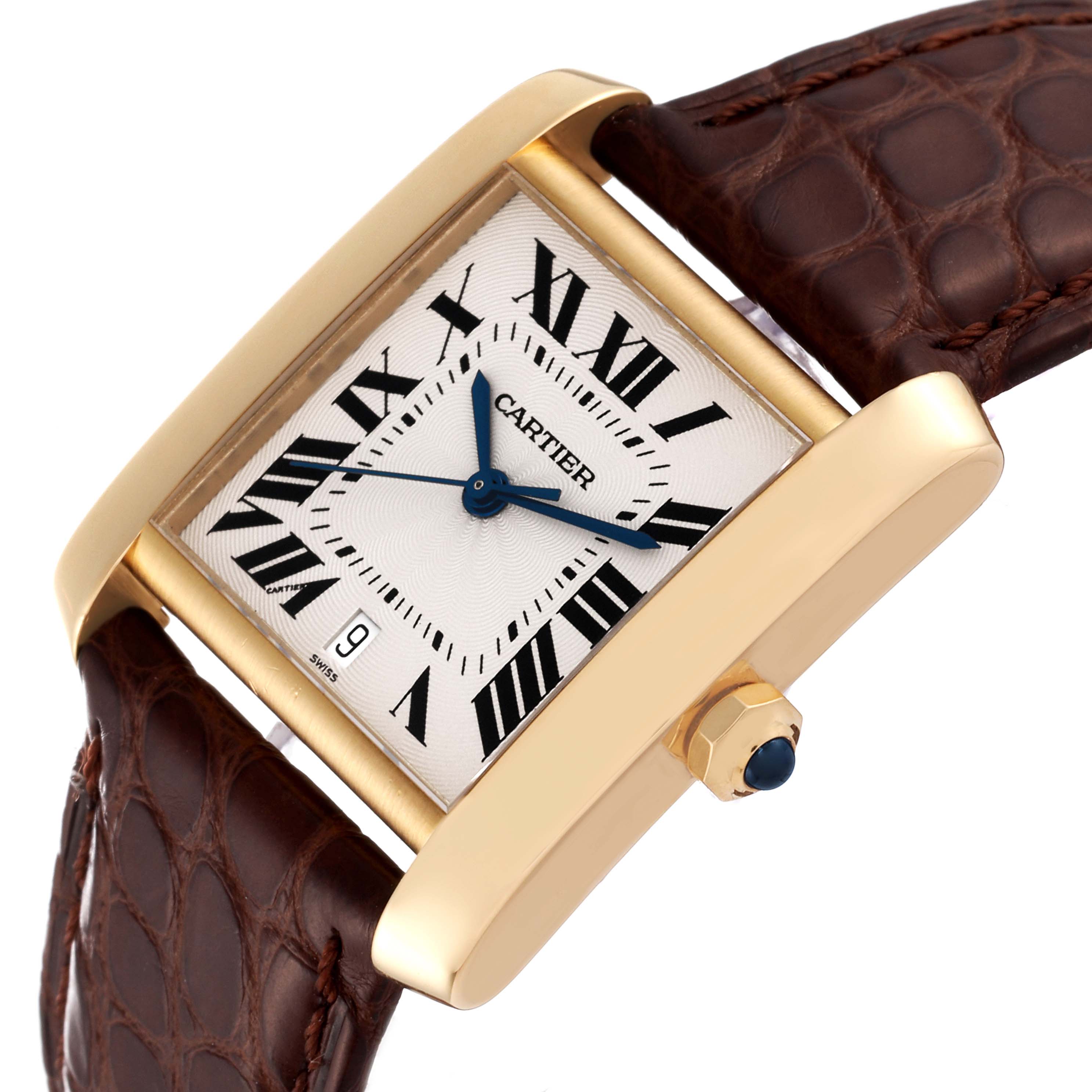 The image shows a Cartier Tank Francaise W5000156 Men's Yellow Gold Silver Dial W5000156 Men's Yellow Gold Silver Dial watch angled horizontally, highlighting its gold case, Roman numeral dial, and brown leather strap.