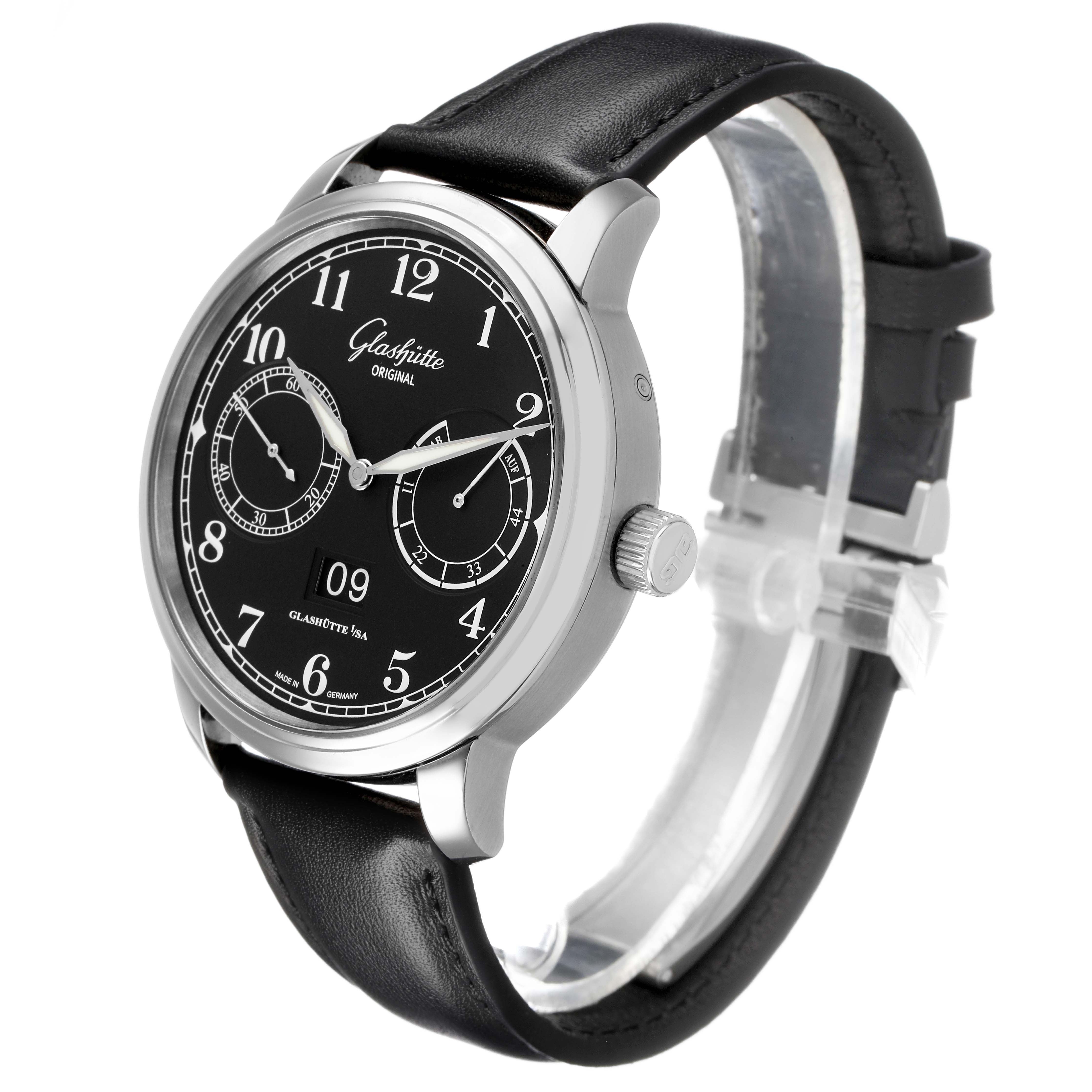 The Glashütte Senator watch is shown at a three-quarter angle, highlighting the black dial, crown, and leather strap.