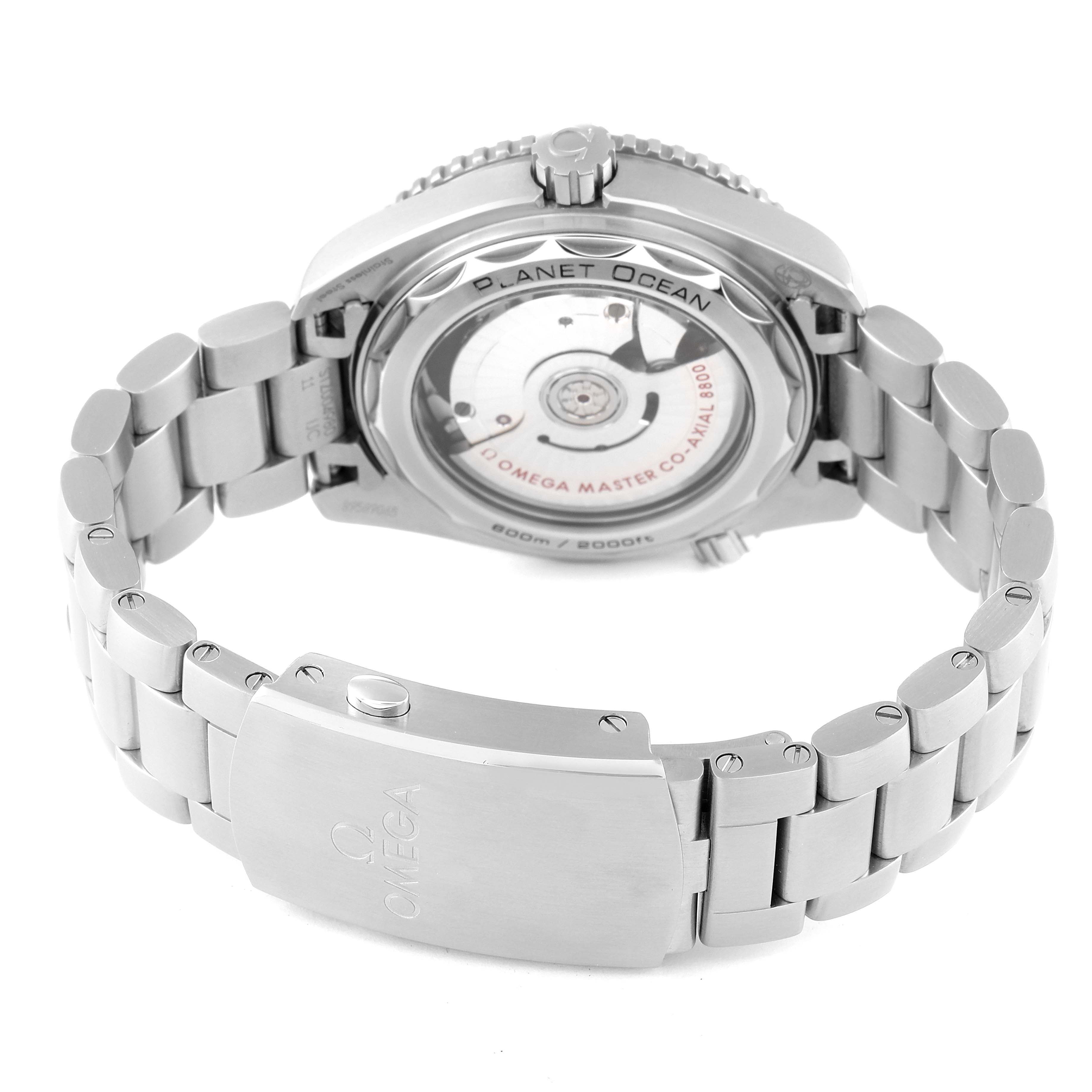 The image shows the underside and clasp of an Omega Planet Ocean 215.30.40.20.01.001 Men
s Stainless Steel Black Dial 215.30.40.20.01.001 Men
s Stainless Steel Black Dial watch, highlighting its stainless steel bracelet and case back.