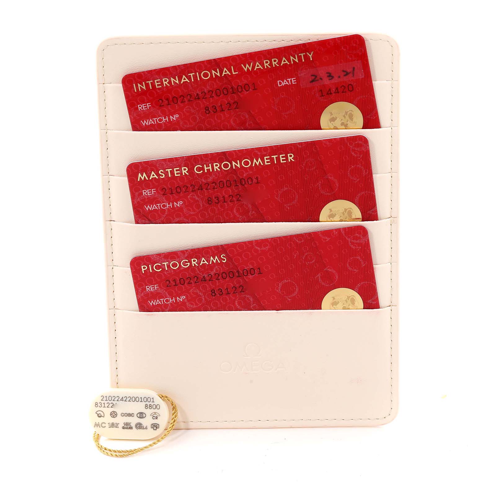 This image shows the warranty cards and tags for the Omega Seamaster 210.22.42.20.01.001 Men's Stainless Steel Black Dial 210.22.42.20.01.001 Men's Stainless Steel Black Dial watch displayed in a white cardholder.