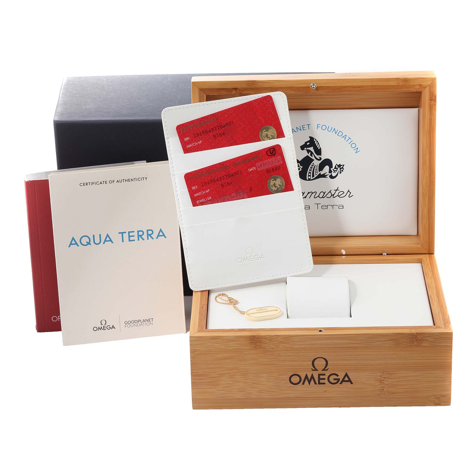 The image shows the Omega Aqua Terra 231.90.43.22.04.001 Men's Stainless Steel White Dial 231.90.43.22.04.001 Men's Stainless Steel White Dial watch's wooden box, warranty cards, booklet, and keychain, viewed from the top front angle.
