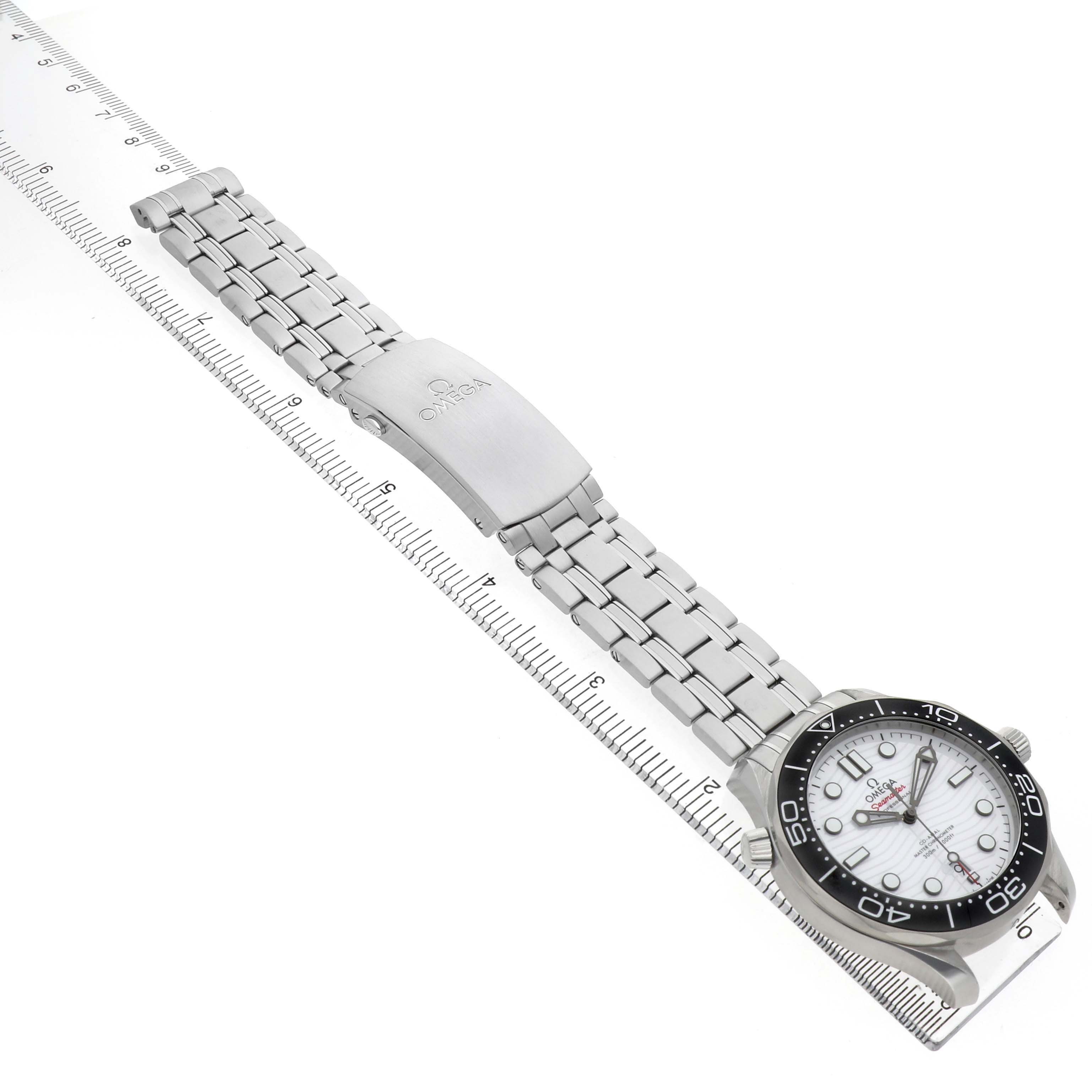 The Omega Seamaster 210.32.42.20.04.001 Men's Stainless Steel White Dial watch is shown from a top view, displaying its face, bezel, stainless steel bracelet, and clasp.